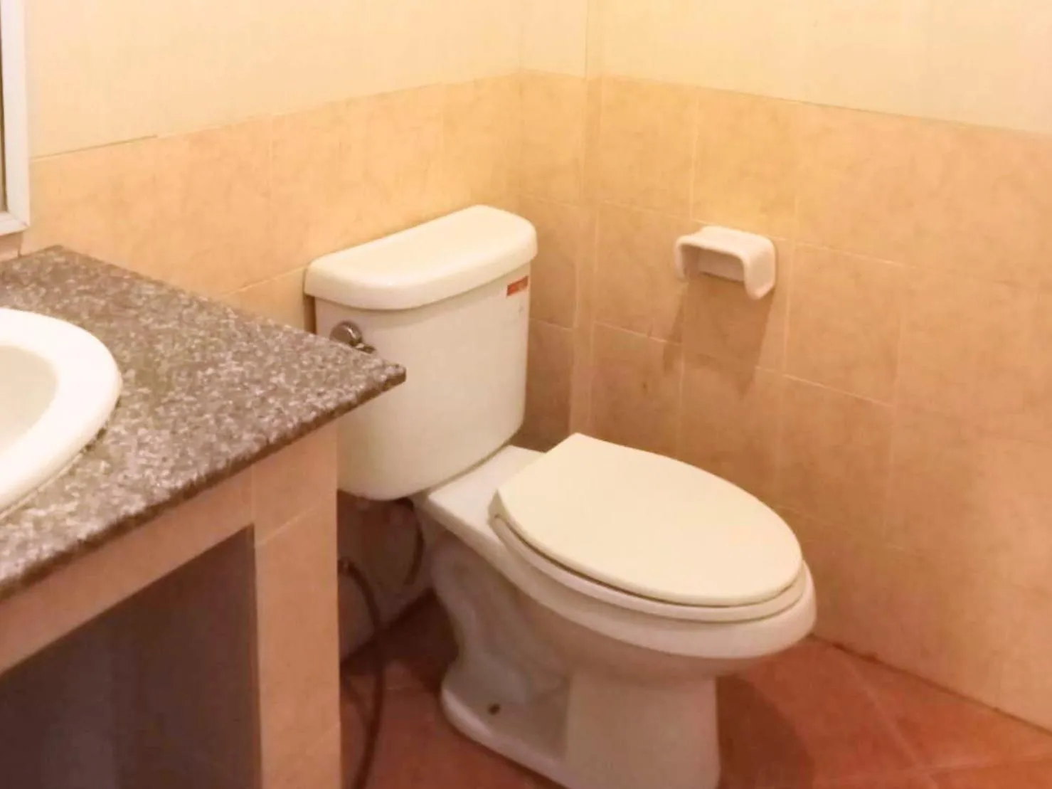 Toilet in Bank Guesthouse