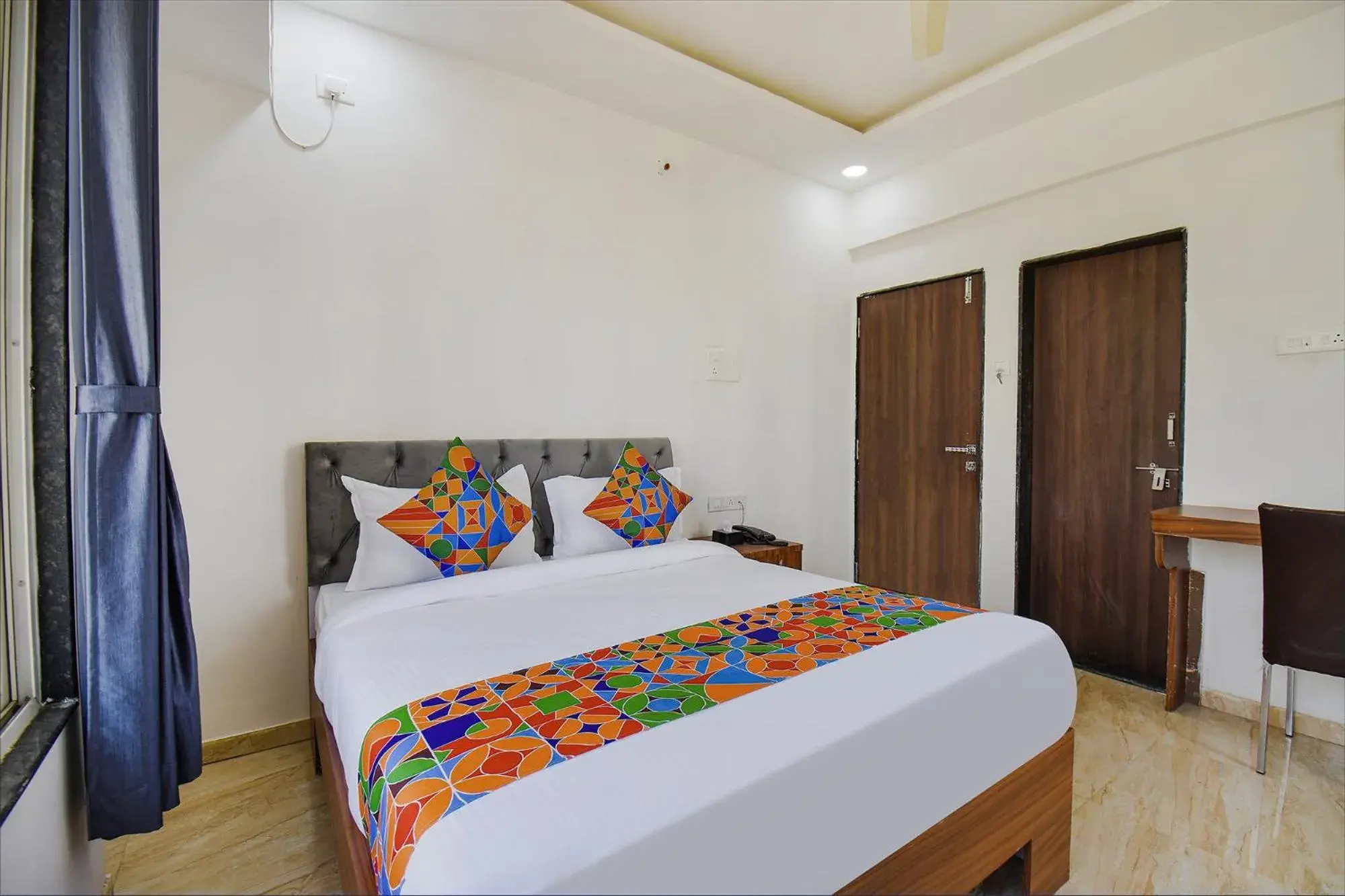 Deluxe Room - single occupancy in FabHotel Red Velvet Inn & Suites Deluxe Room - single occupancy in FabHotel Red Velvet Inn & Suites