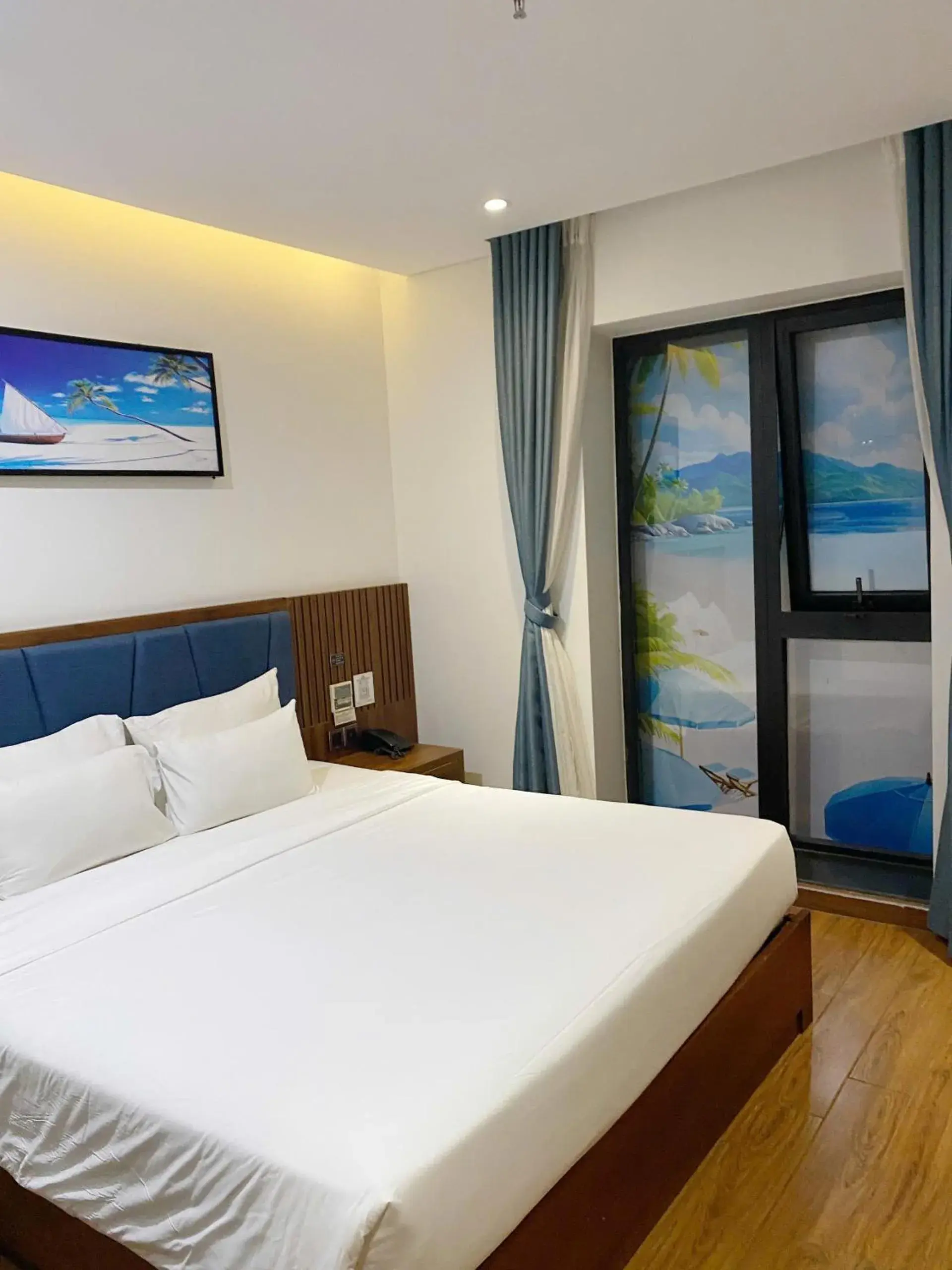 Photo of the whole room, Bed in Ruby Star Da Nang - Central My Khe Beach Photo of the whole room, Bed in Ruby Star Da Nang - Central My Khe Beach