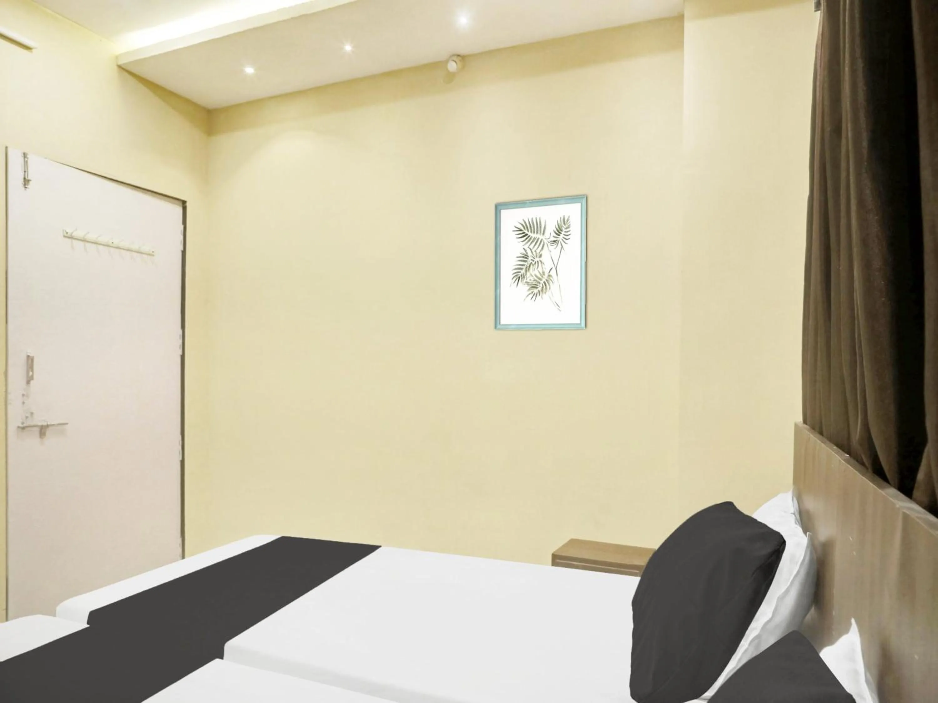 Bedroom in SPOT ON Grand Mantralayam