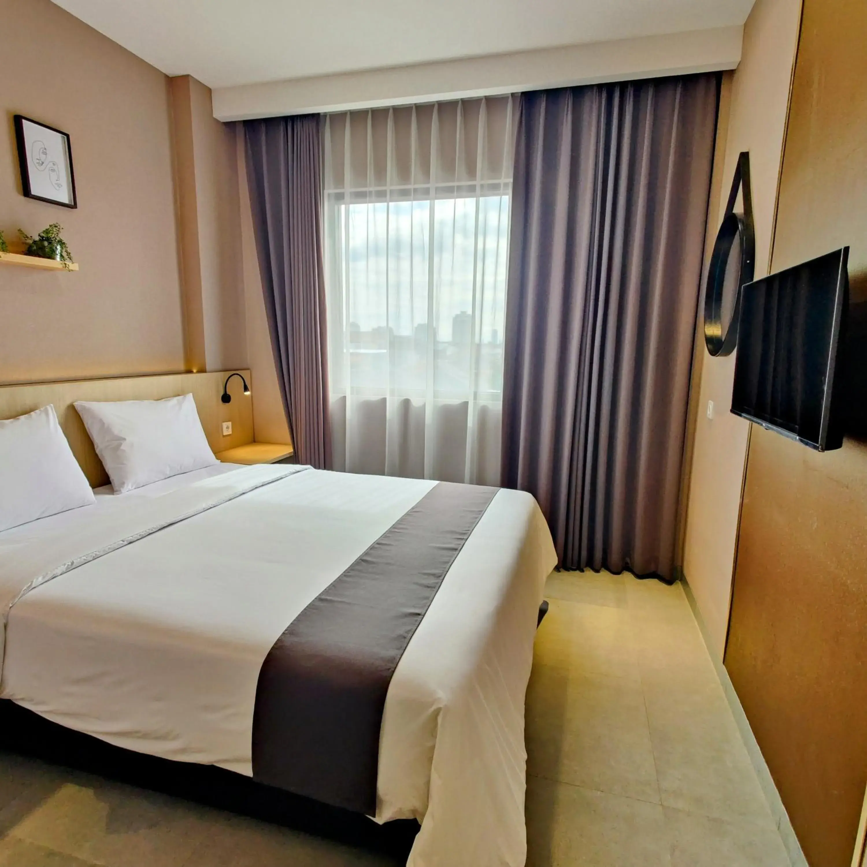 Bed in The Mango Suites by Flat06 Bed in The Mango Suites by Flat06