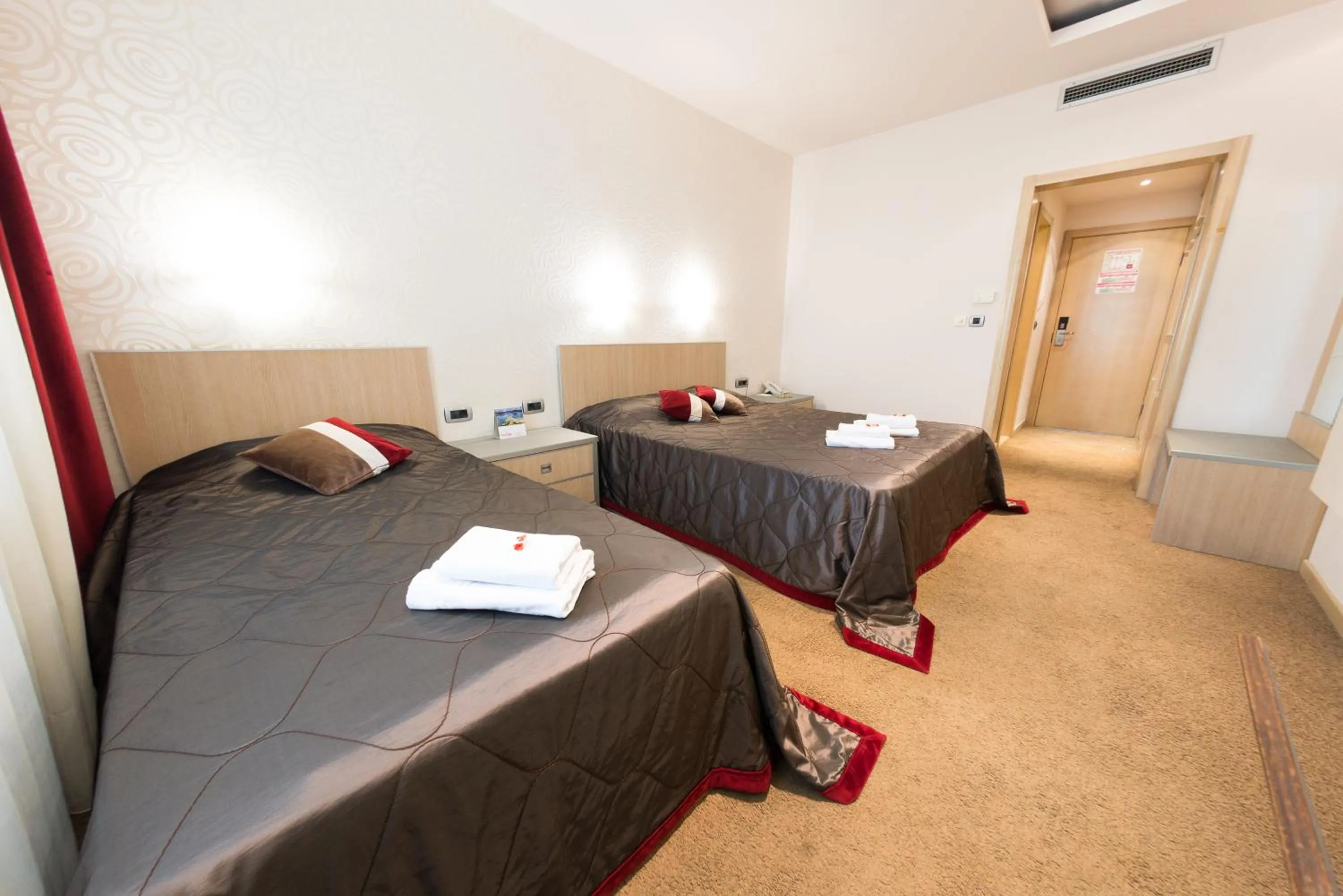 Bed in Garni Hotel Vigor - EV station