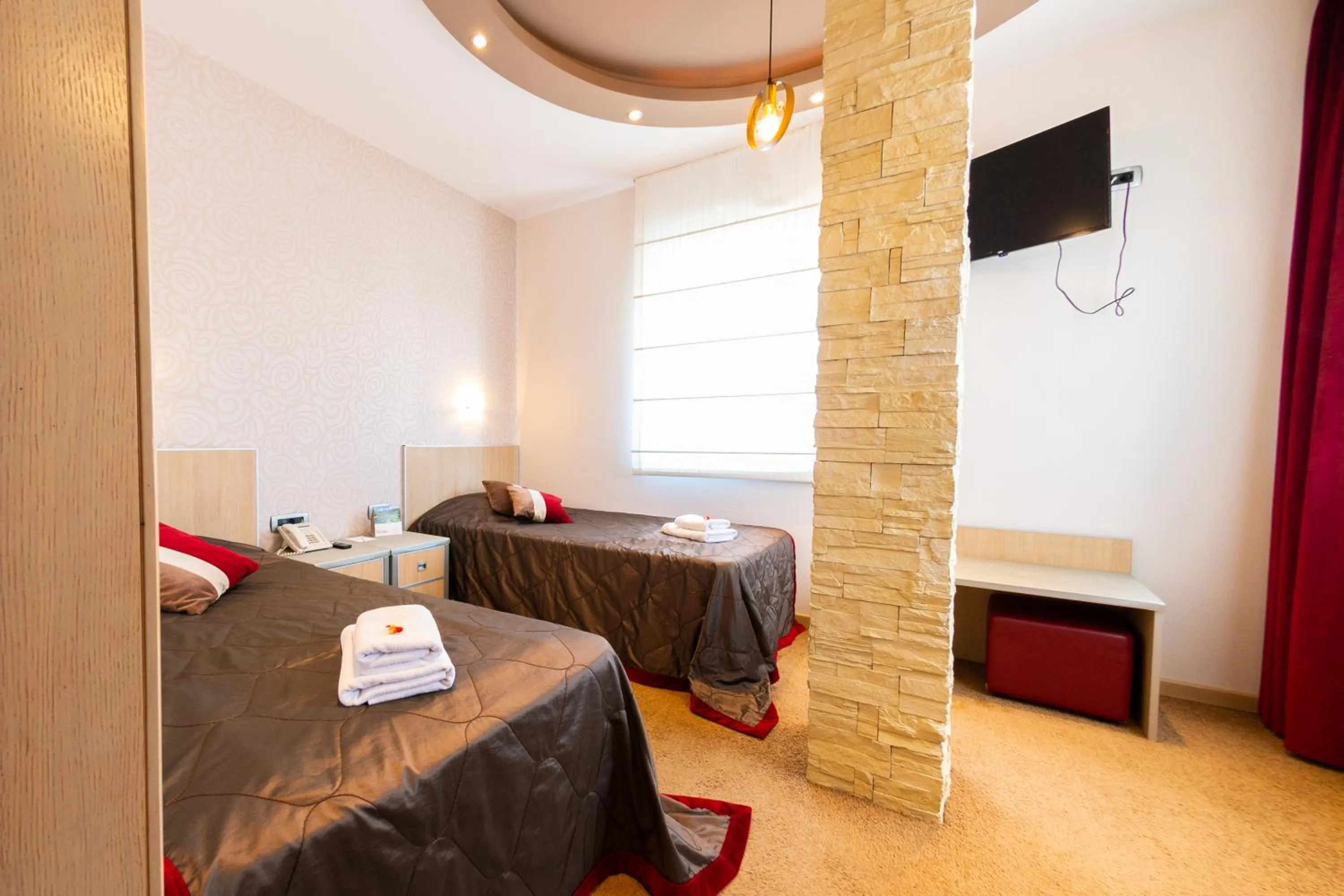 Photo of the whole room, Bed in Garni Hotel Vigor - EV station
