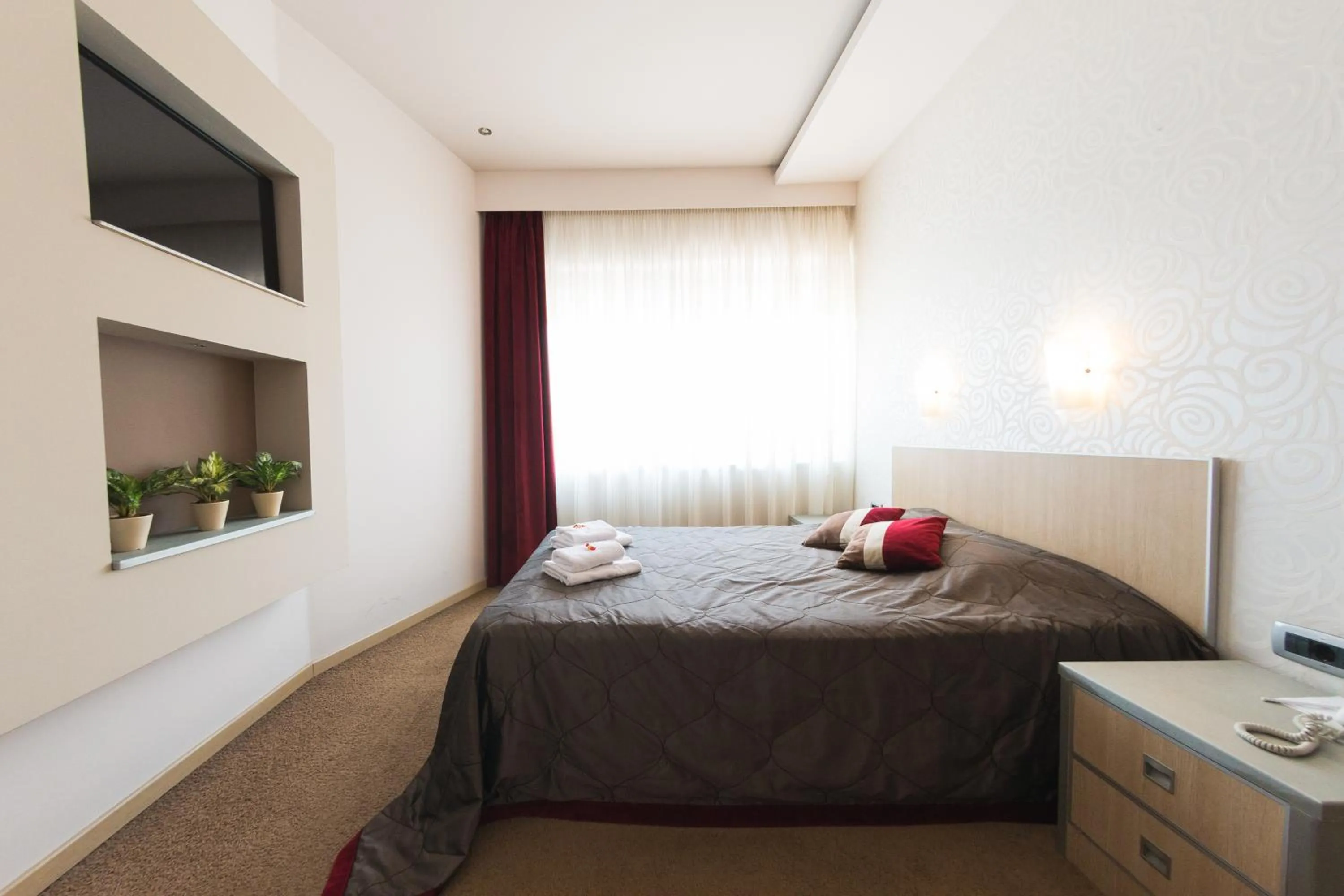 Bed in Garni Hotel Vigor - EV station
