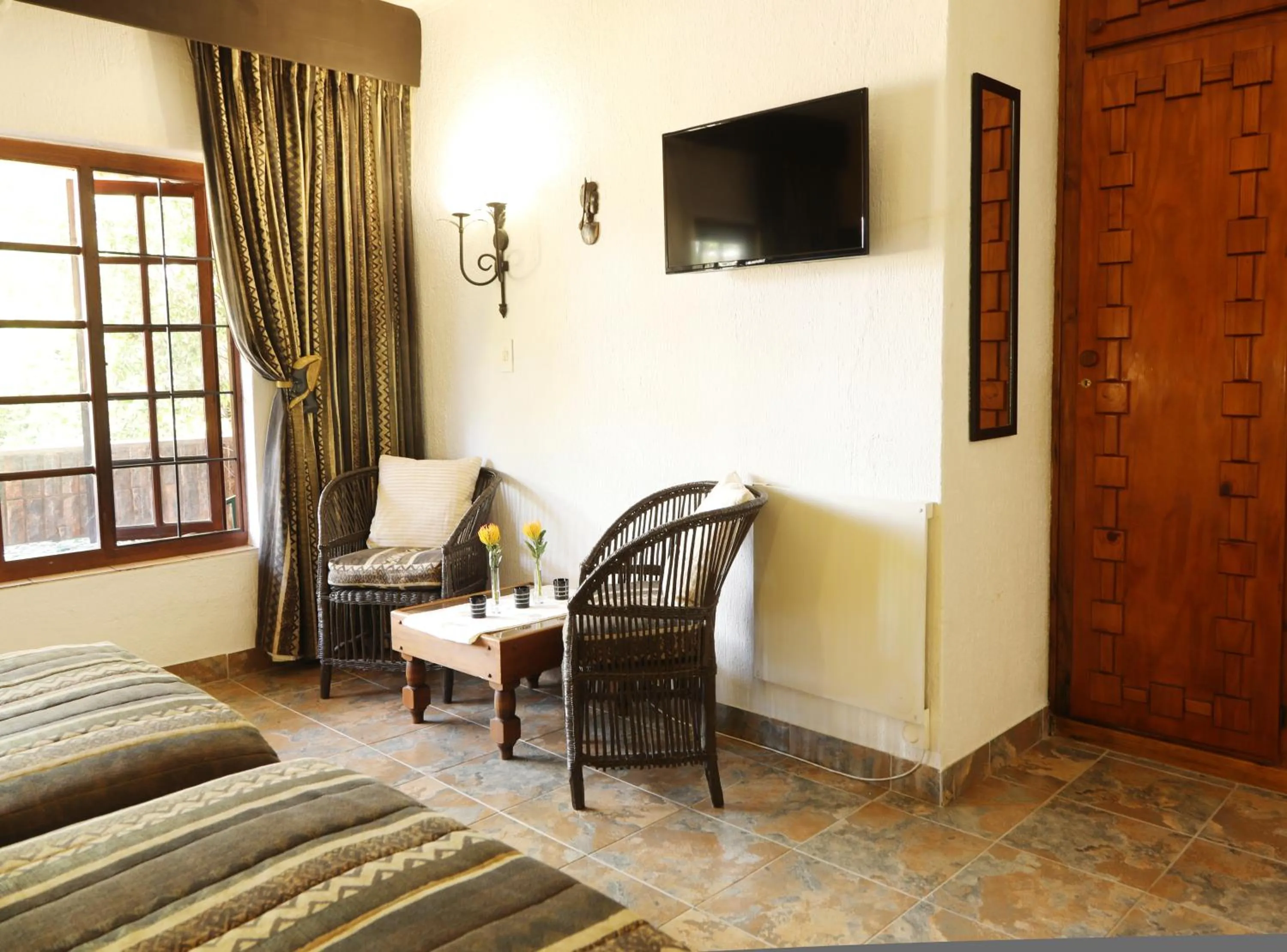 Seating area, Bed in Villa Ticino Guest House