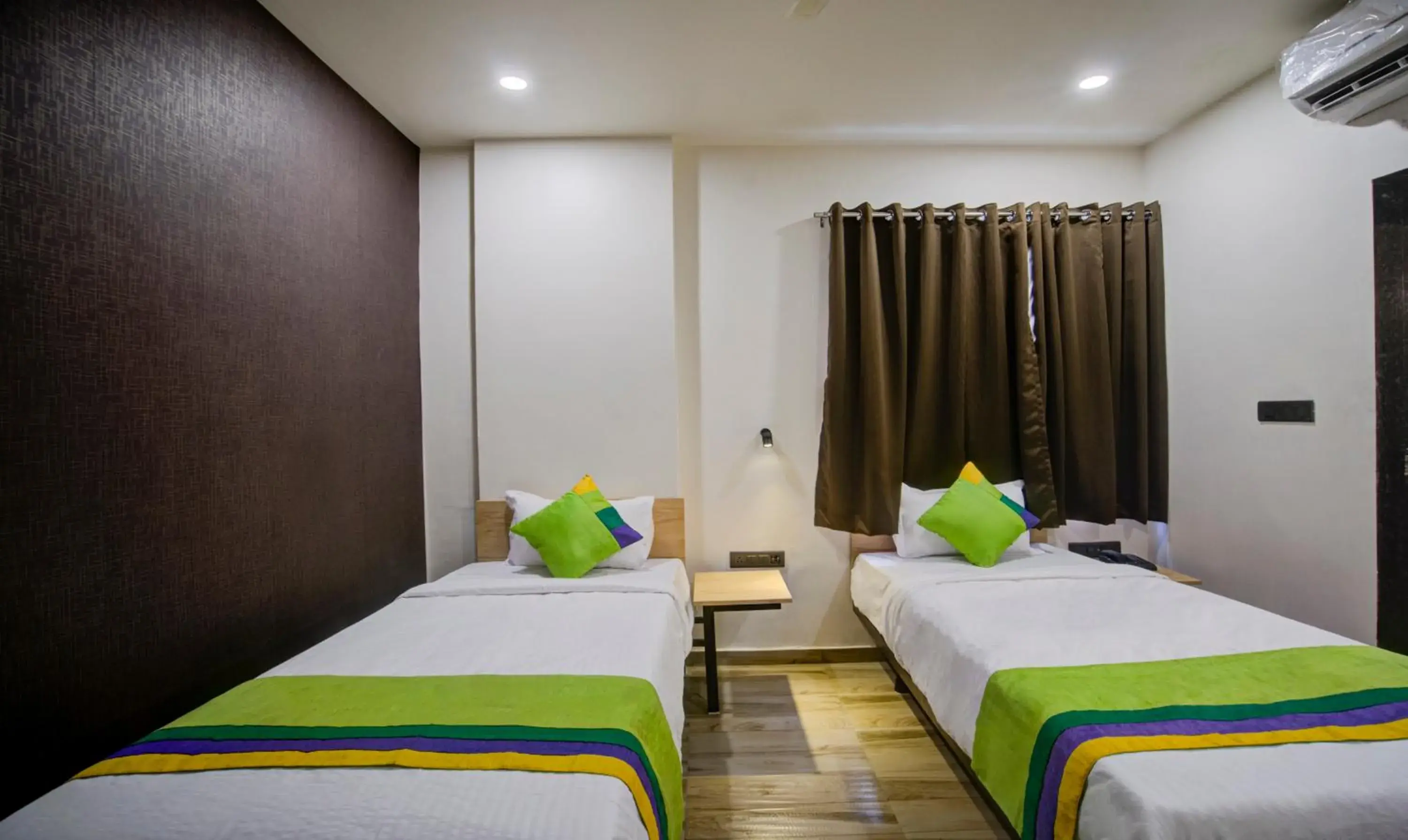 Bedroom, Bed in Treebo Grand Lotus - 3 km from Textile Market Bedroom, Bed in Treebo Grand Lotus - 3 km from Textile Market