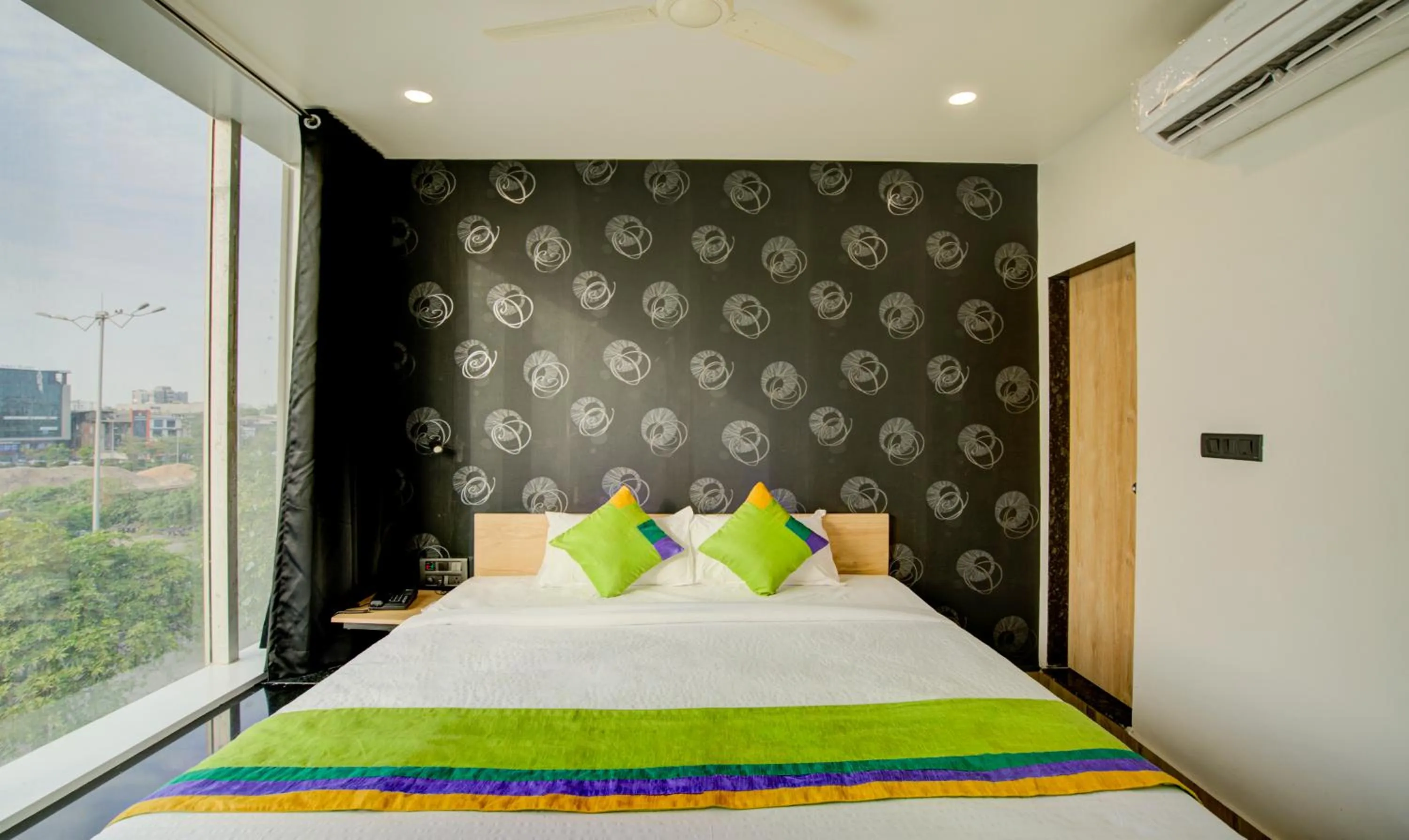 Bedroom, Bed in Treebo Grand Lotus - 3 km from Textile Market