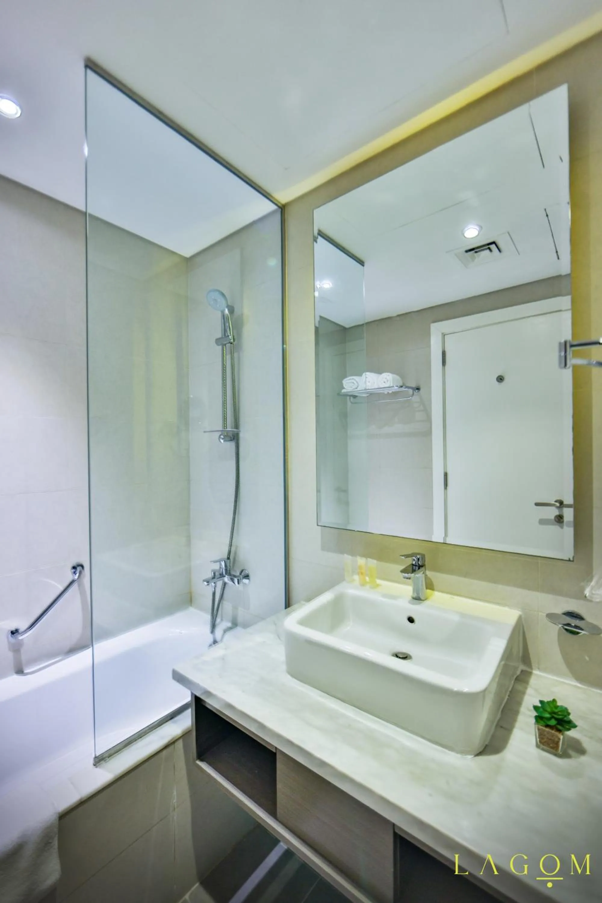 Bathroom in Winds of the Canal by Lagom - Business Bay Dubai