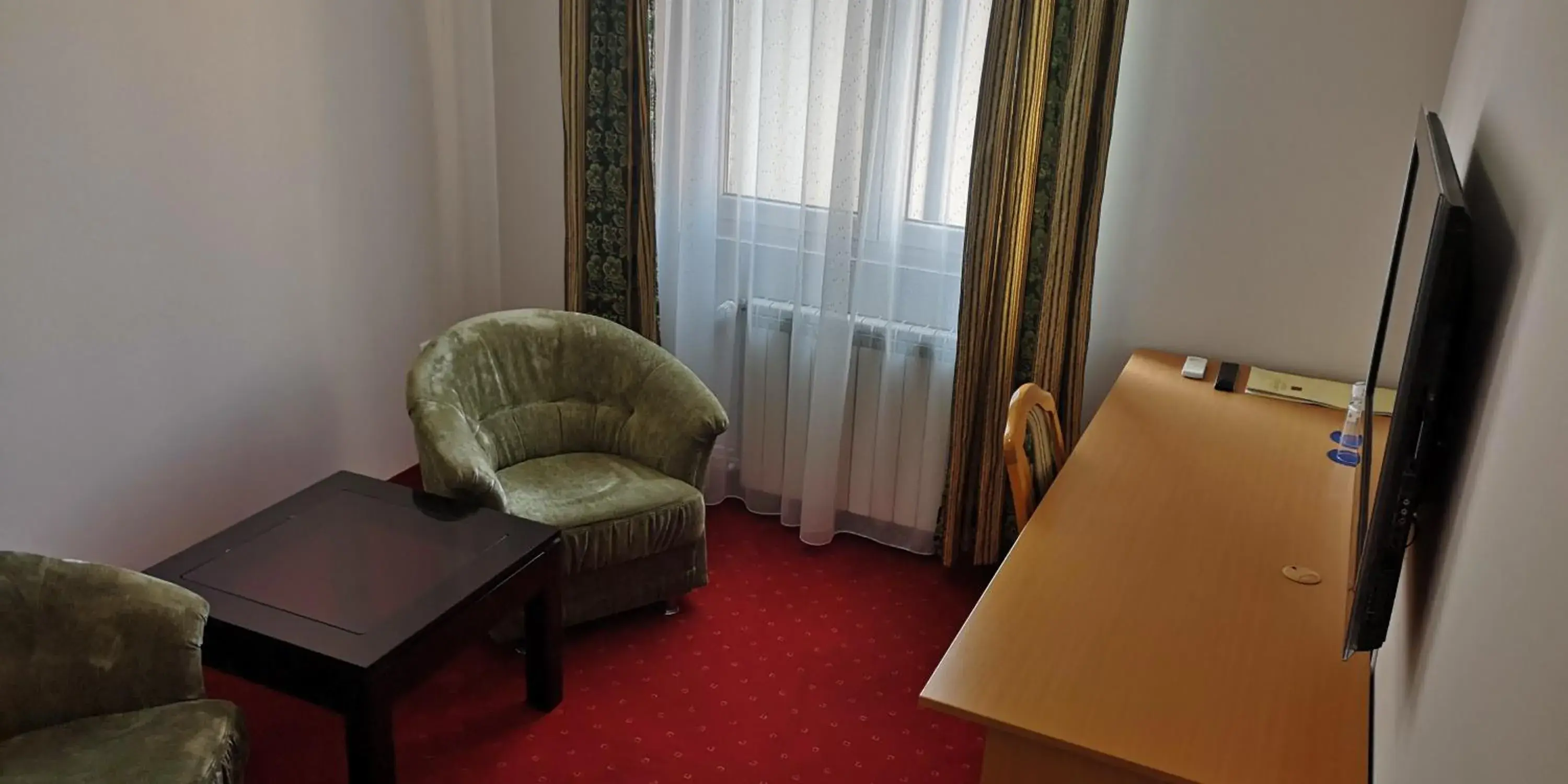 Photo of the whole room in Hotel Elegance Photo of the whole room in Hotel Elegance