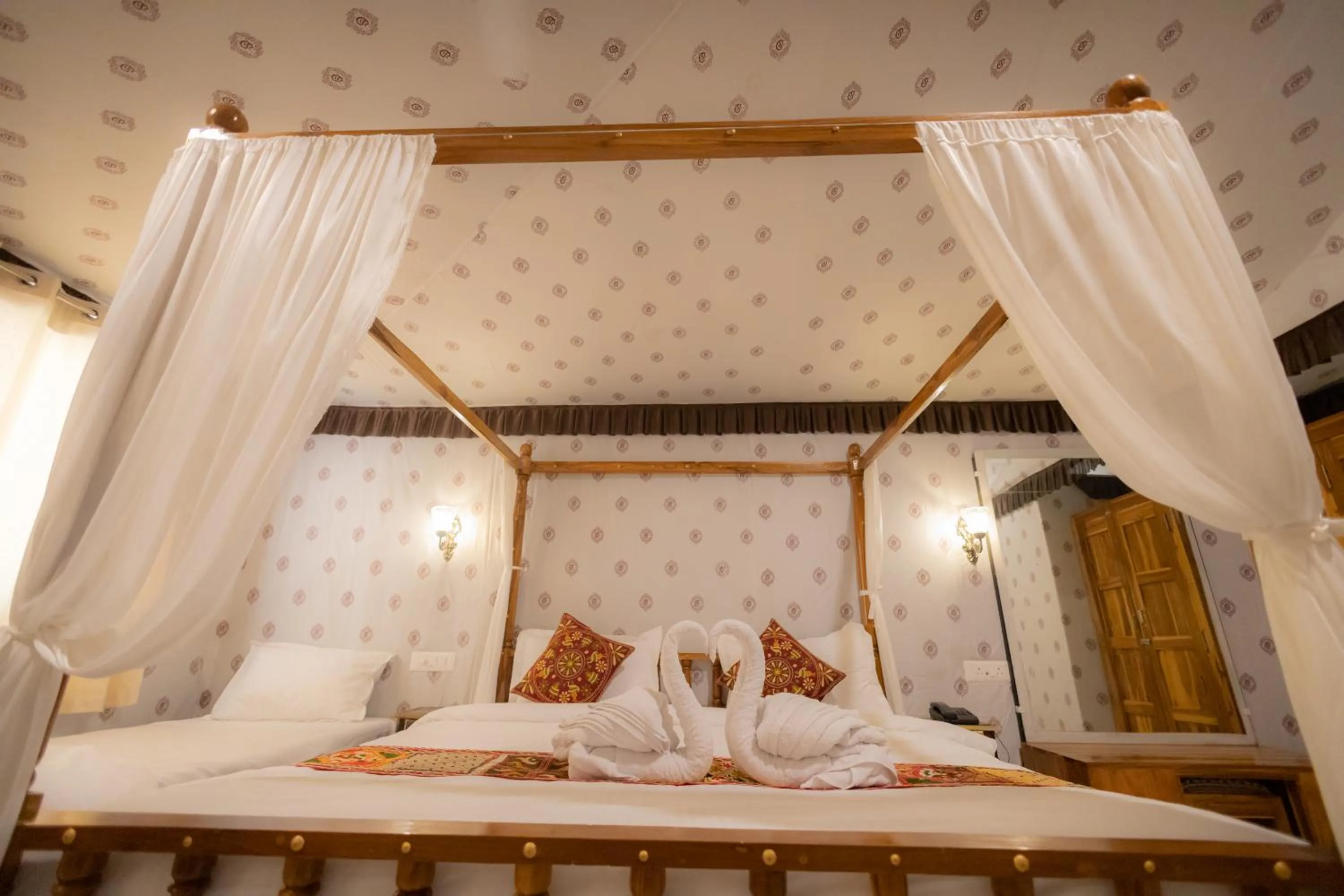 Bed in Vasant Vihar Resort