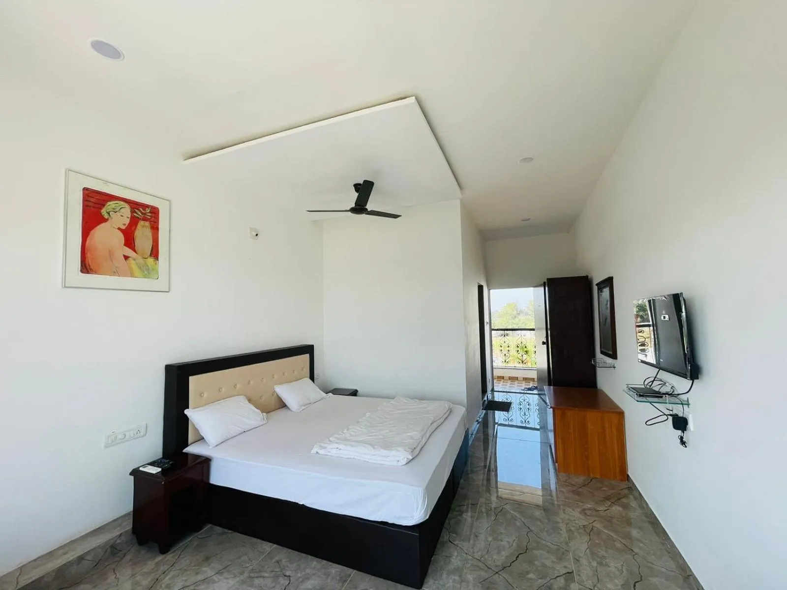Bed in Vasant Vihar Resort