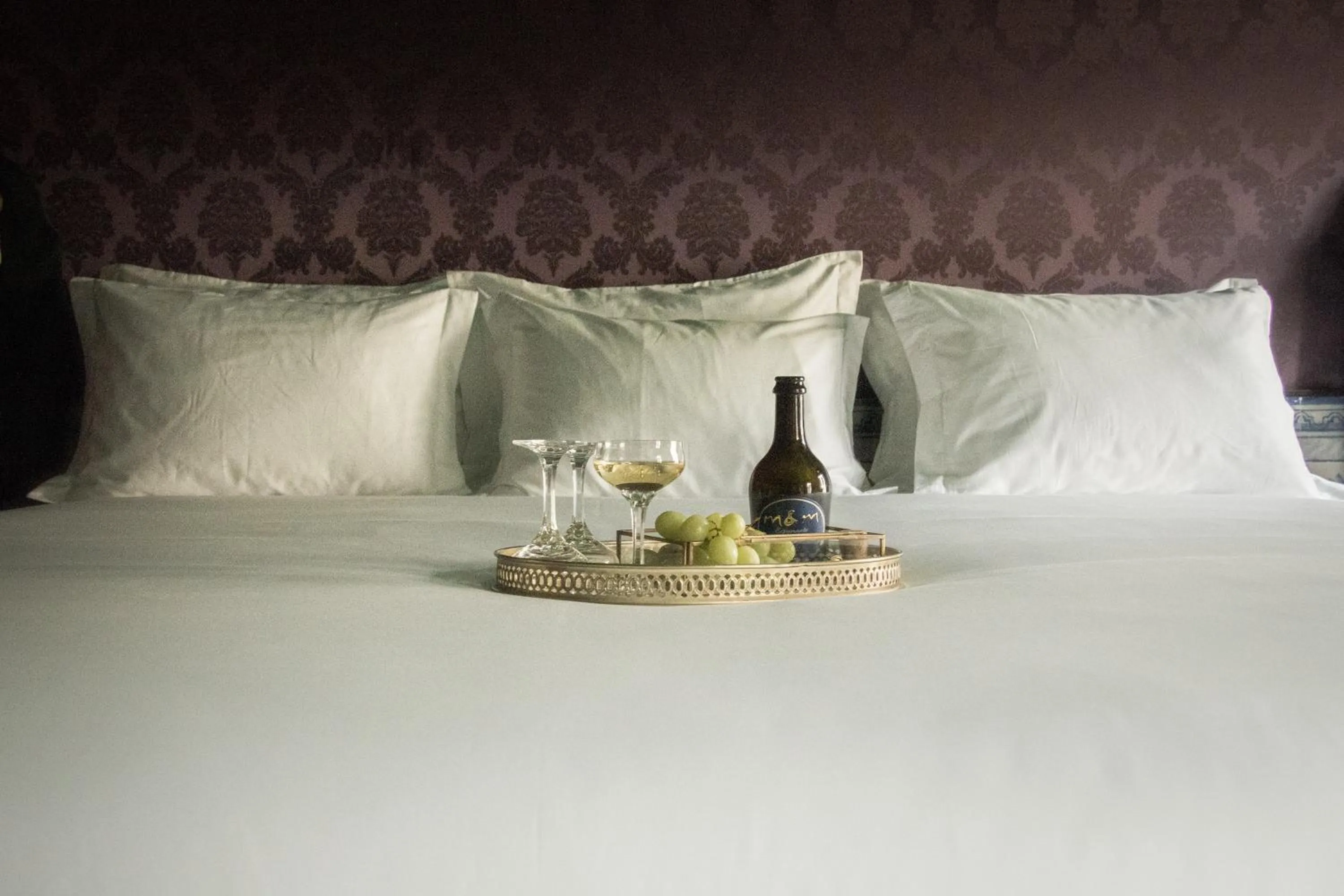 Bed in Pensão Amor Madam's Lodge