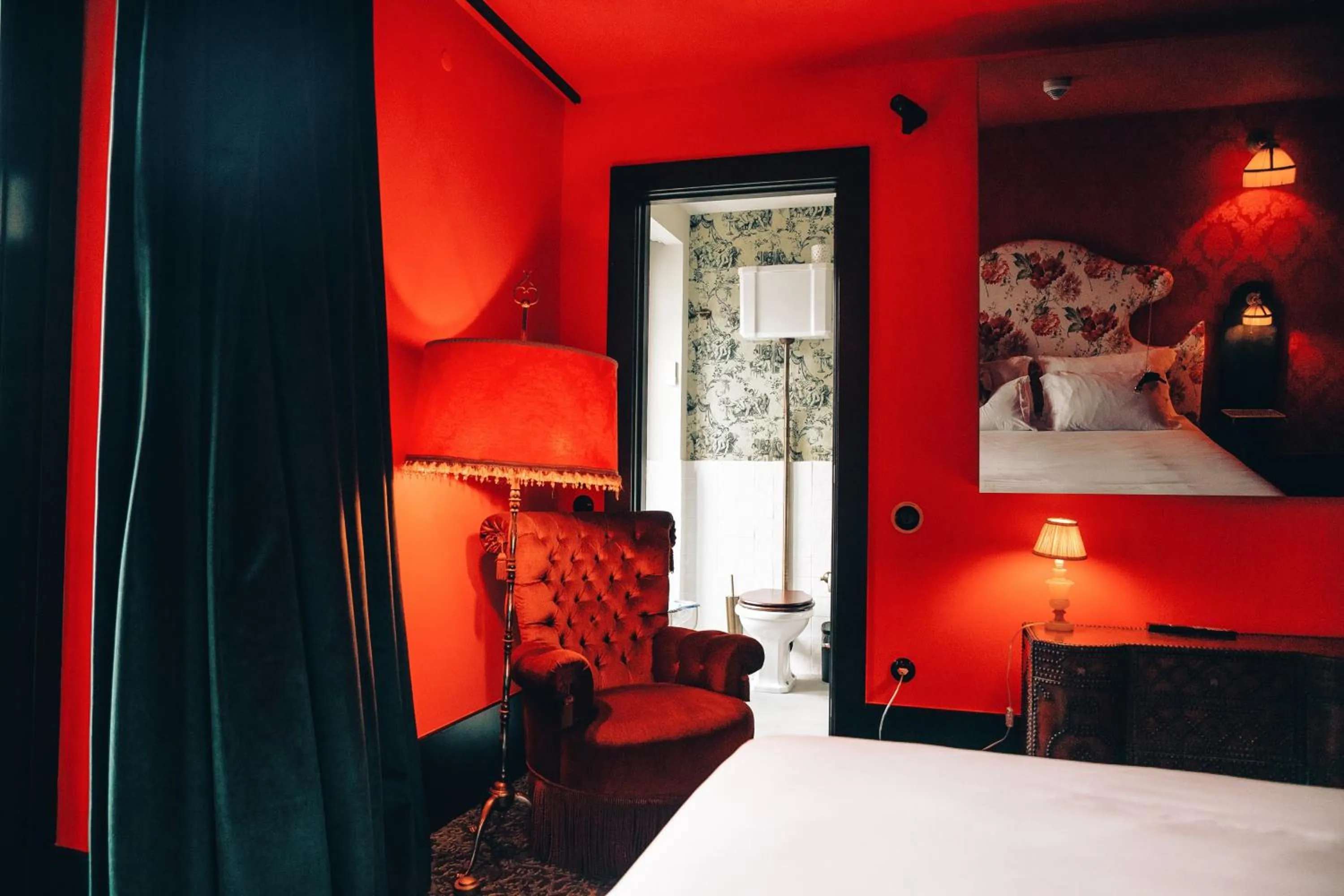 Bed in Pensão Amor Madam's Lodge