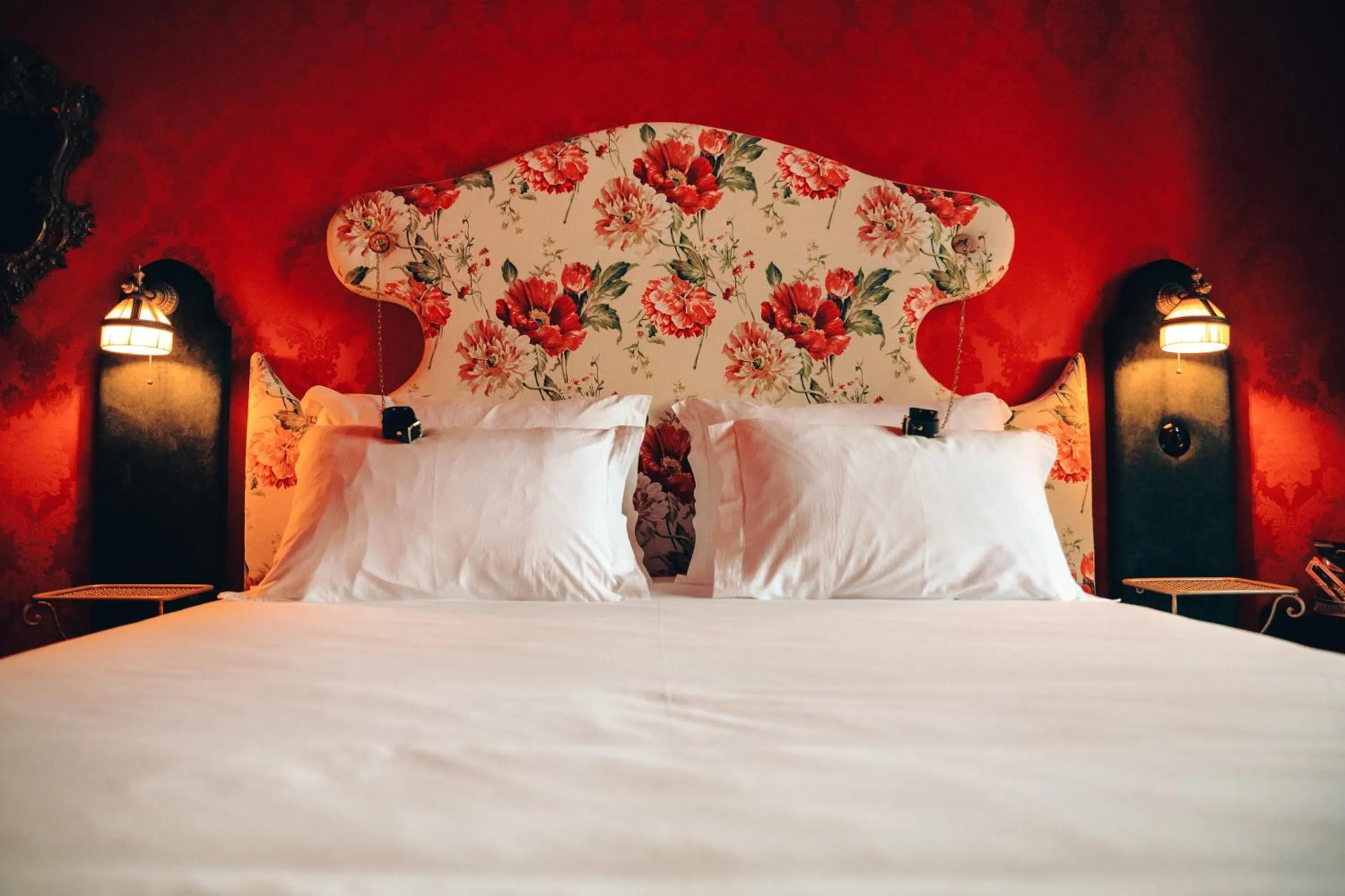 Bed in Pensão Amor Madam's Lodge