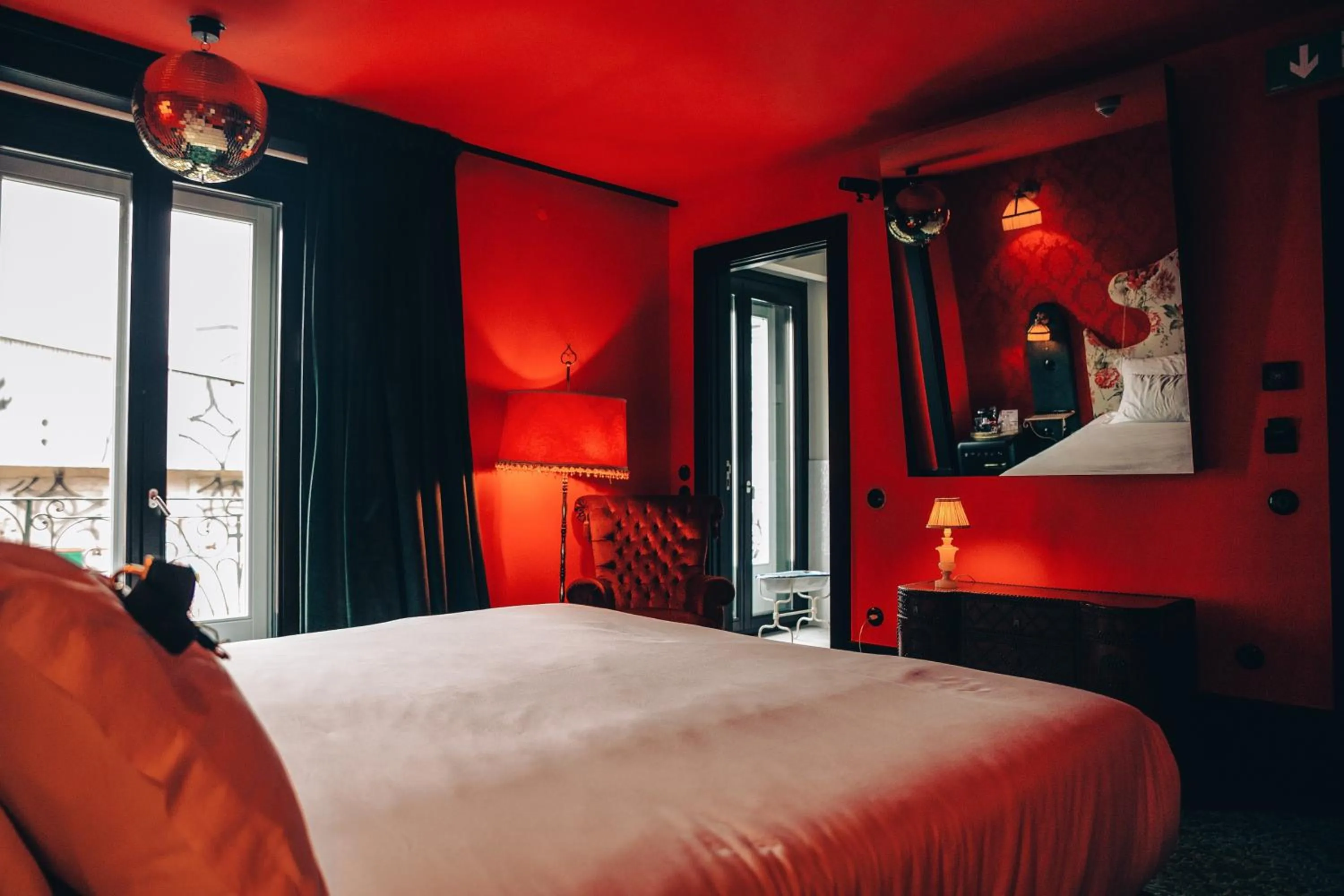 Bed in Pensão Amor Madam's Lodge