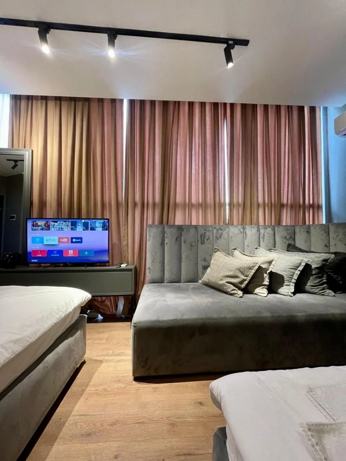 Bed in GRAND JNK Boutique Hotel