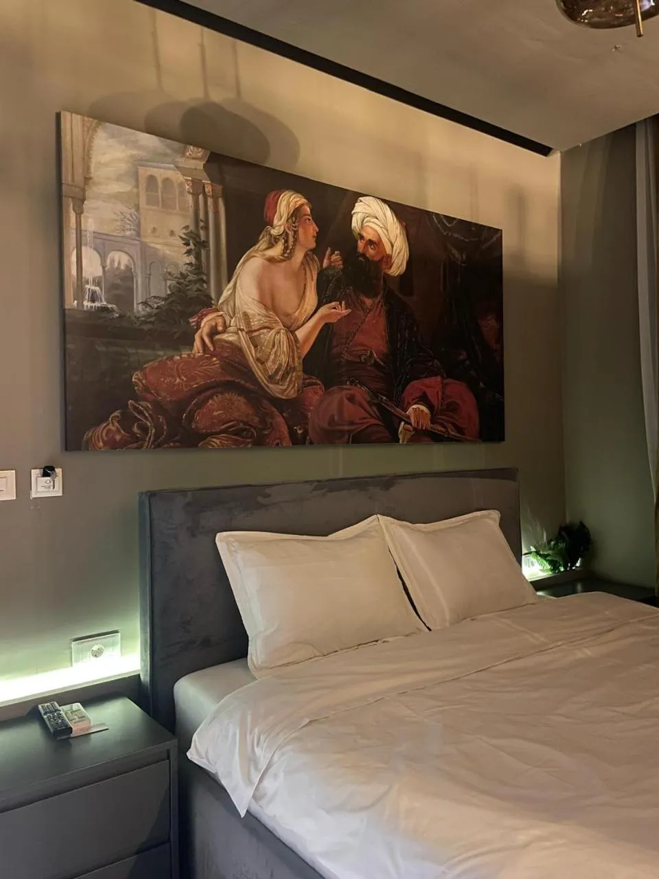 Bed in GRAND JNK Boutique Hotel