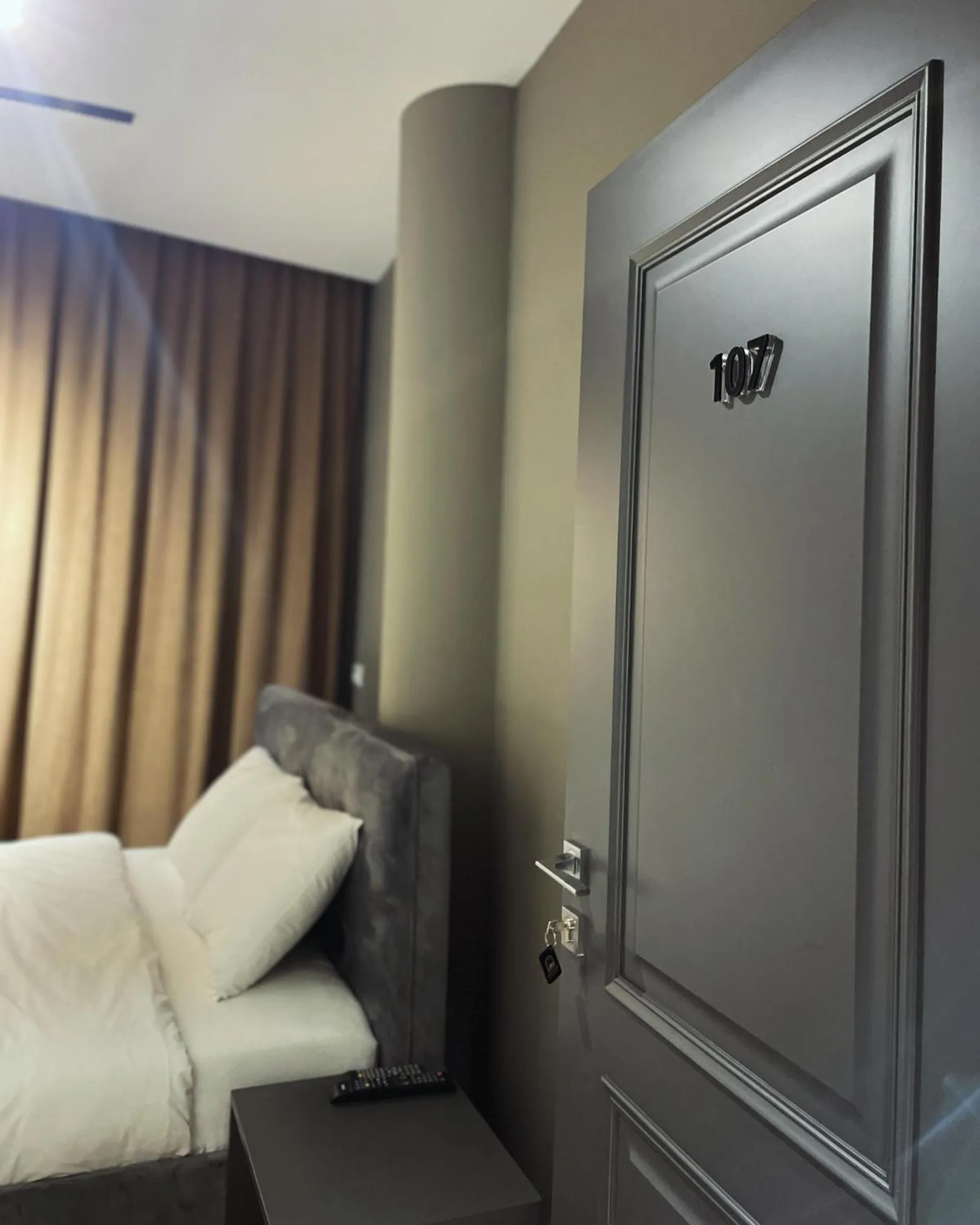 Bed in GRAND JNK Boutique Hotel