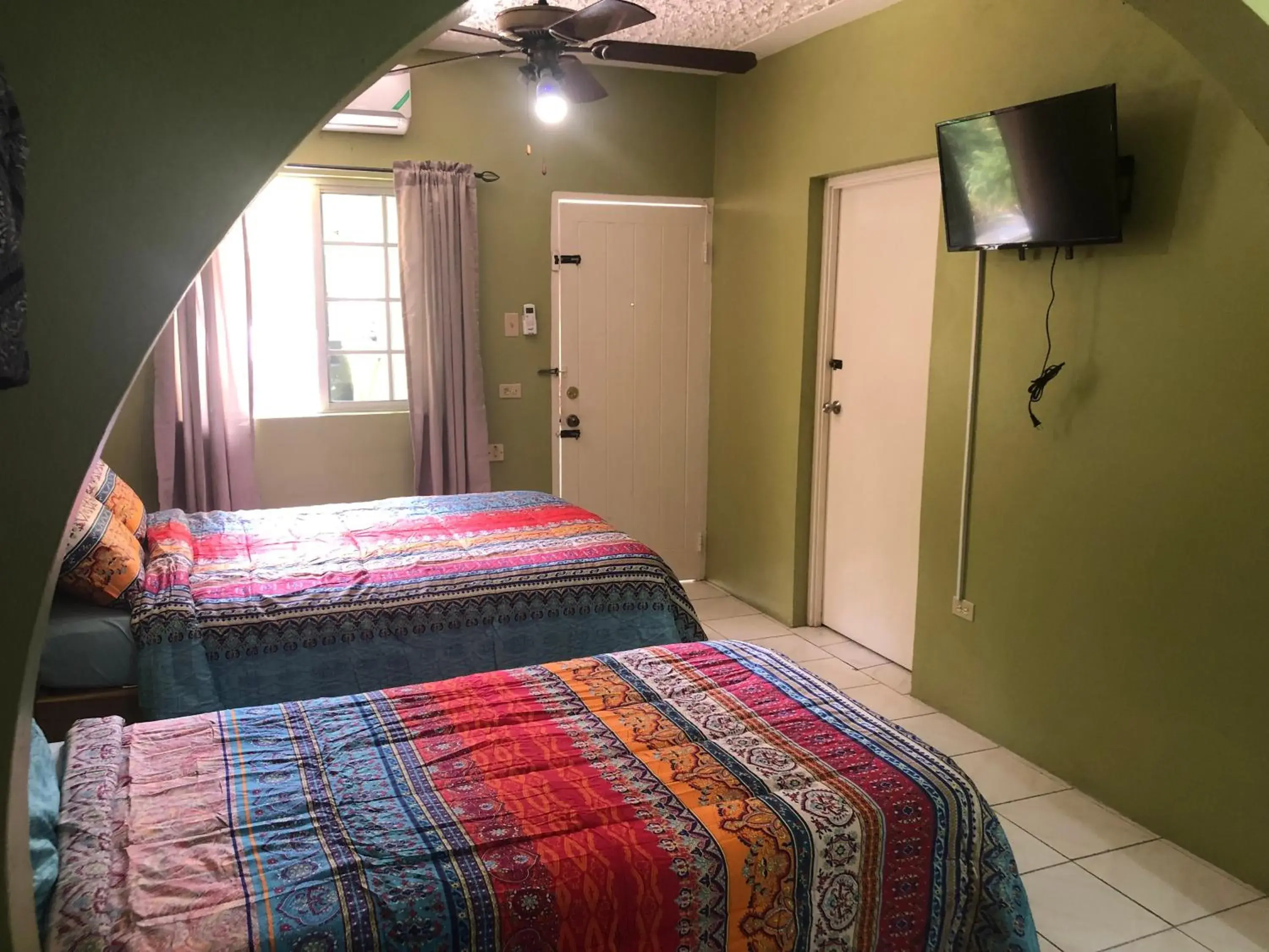 Deluxe Double Room with Extra Bed in Negril Beachside Deluxe Double Room with Extra Bed in Negril Beachside