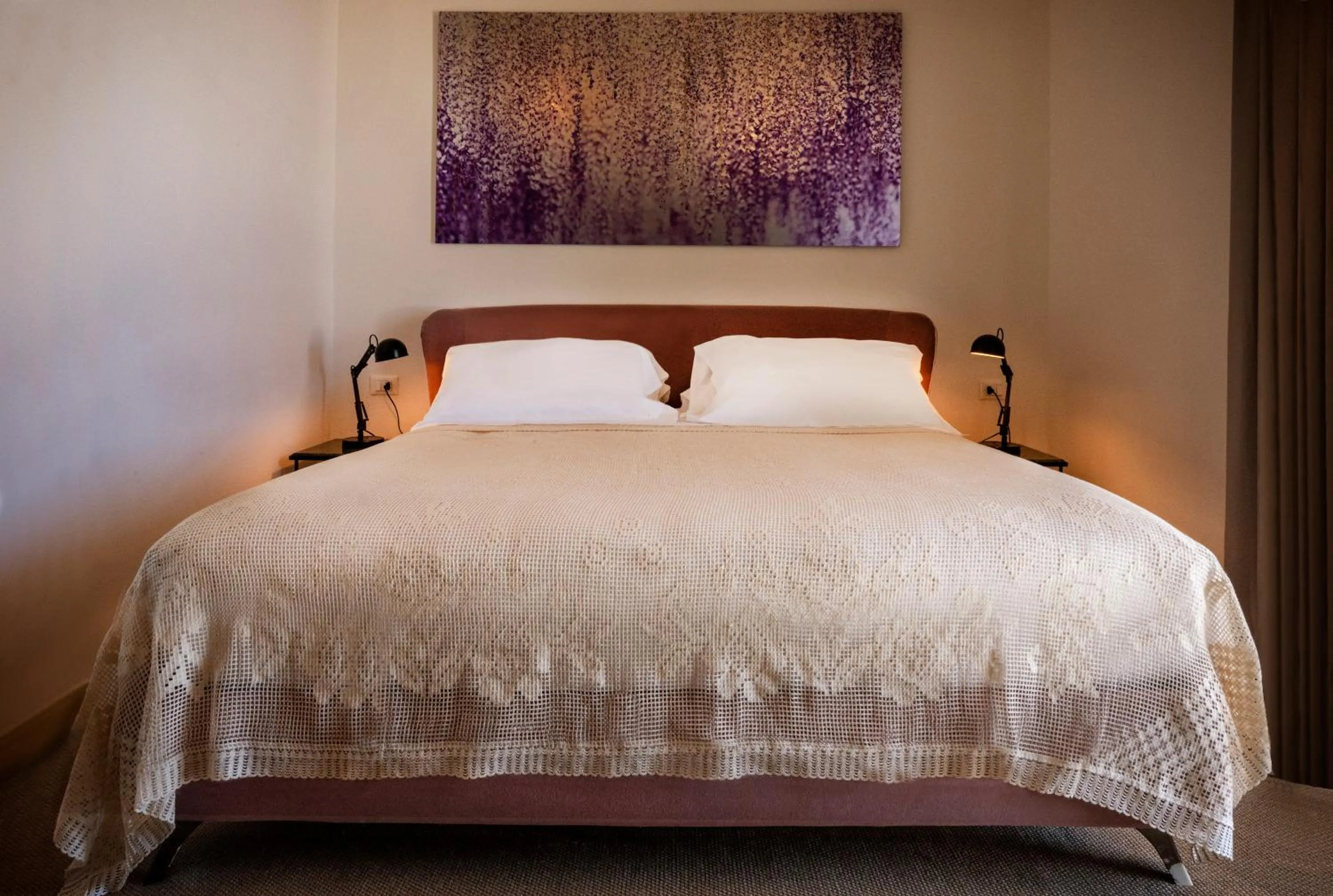 Bed in Aria Rooms and Terrace