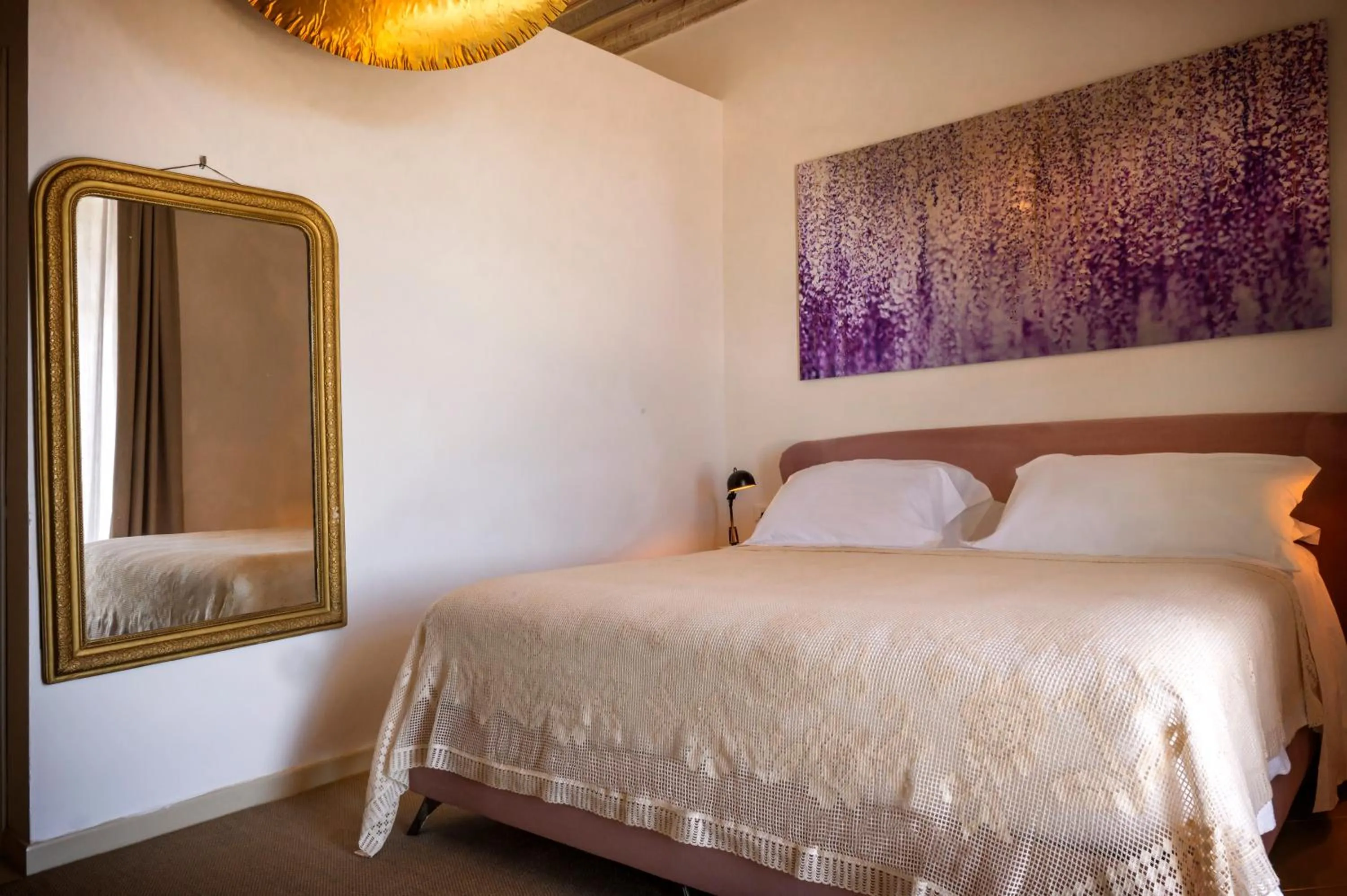 Bed in Aria Rooms and Terrace