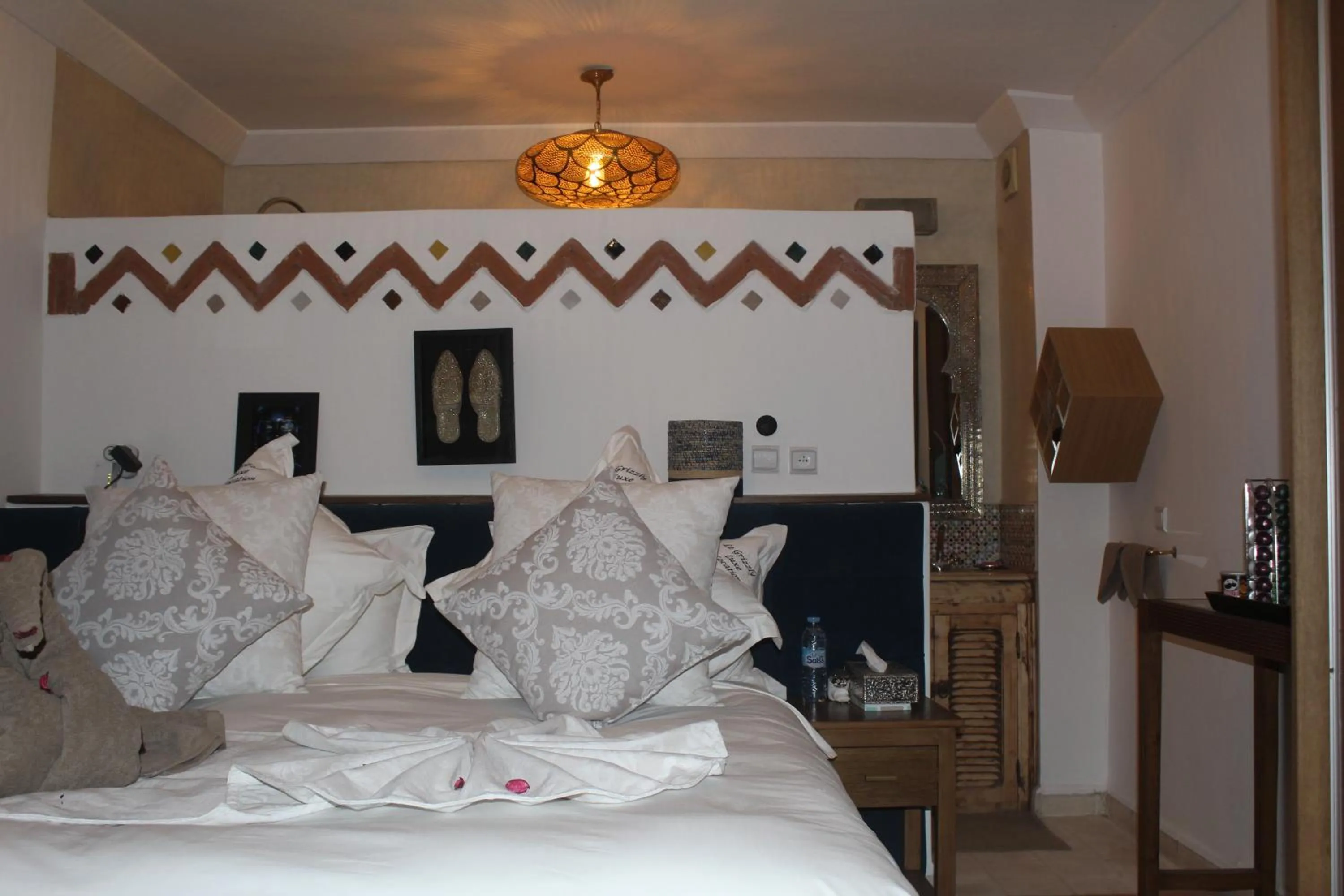 Bed in RIAD LUXE LOCATION le GRIZZLY