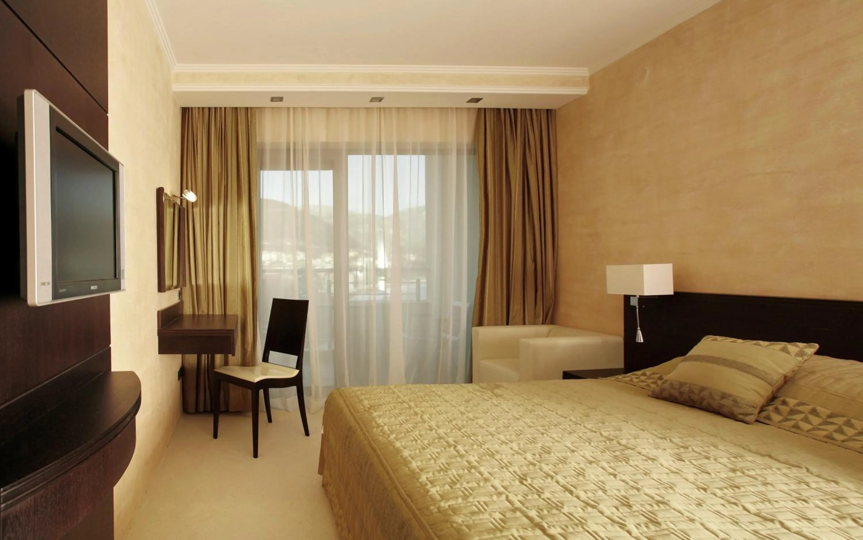 Bed in Monte Casa SPA & Wellness