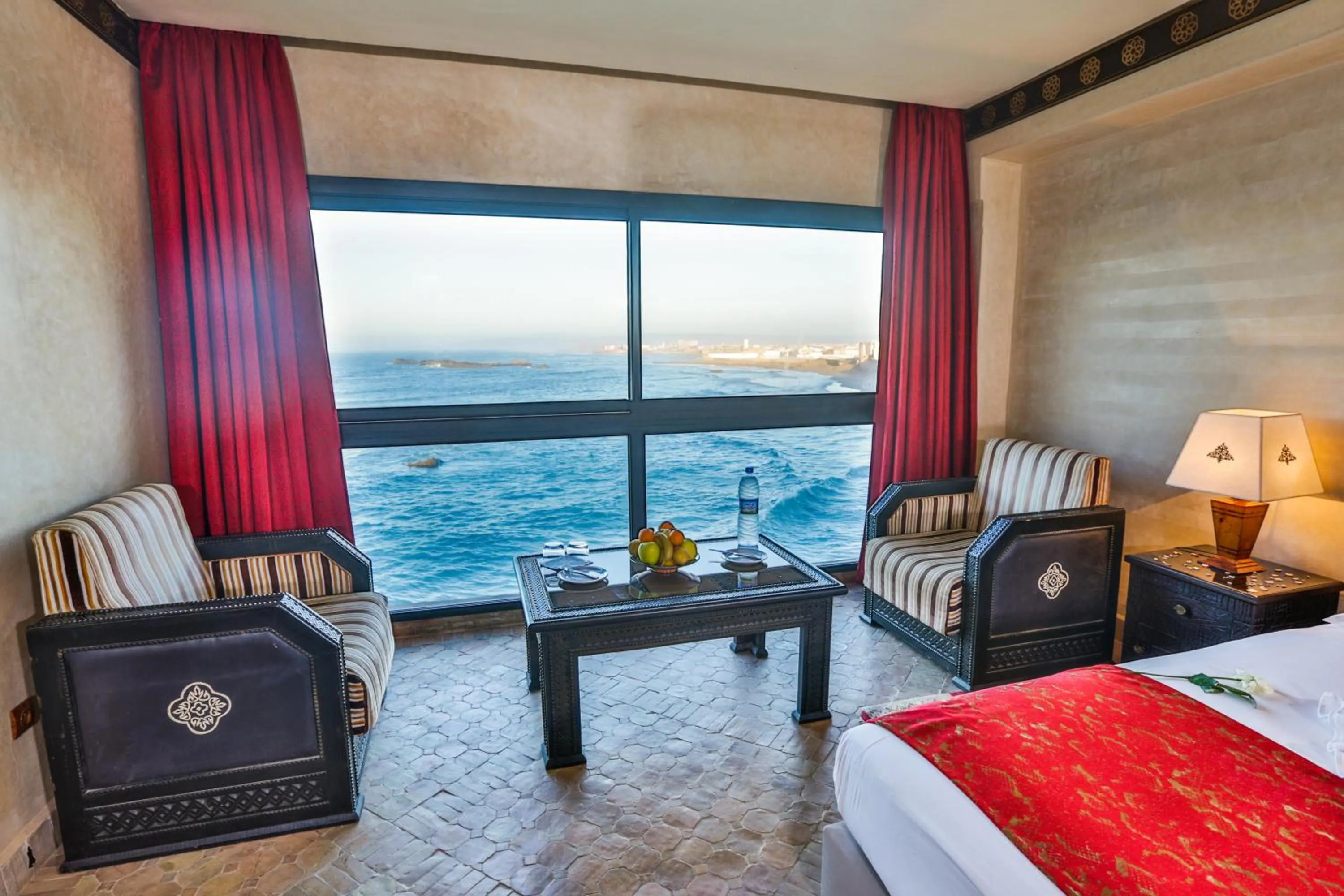 Living room, Bed in Riad Mimouna