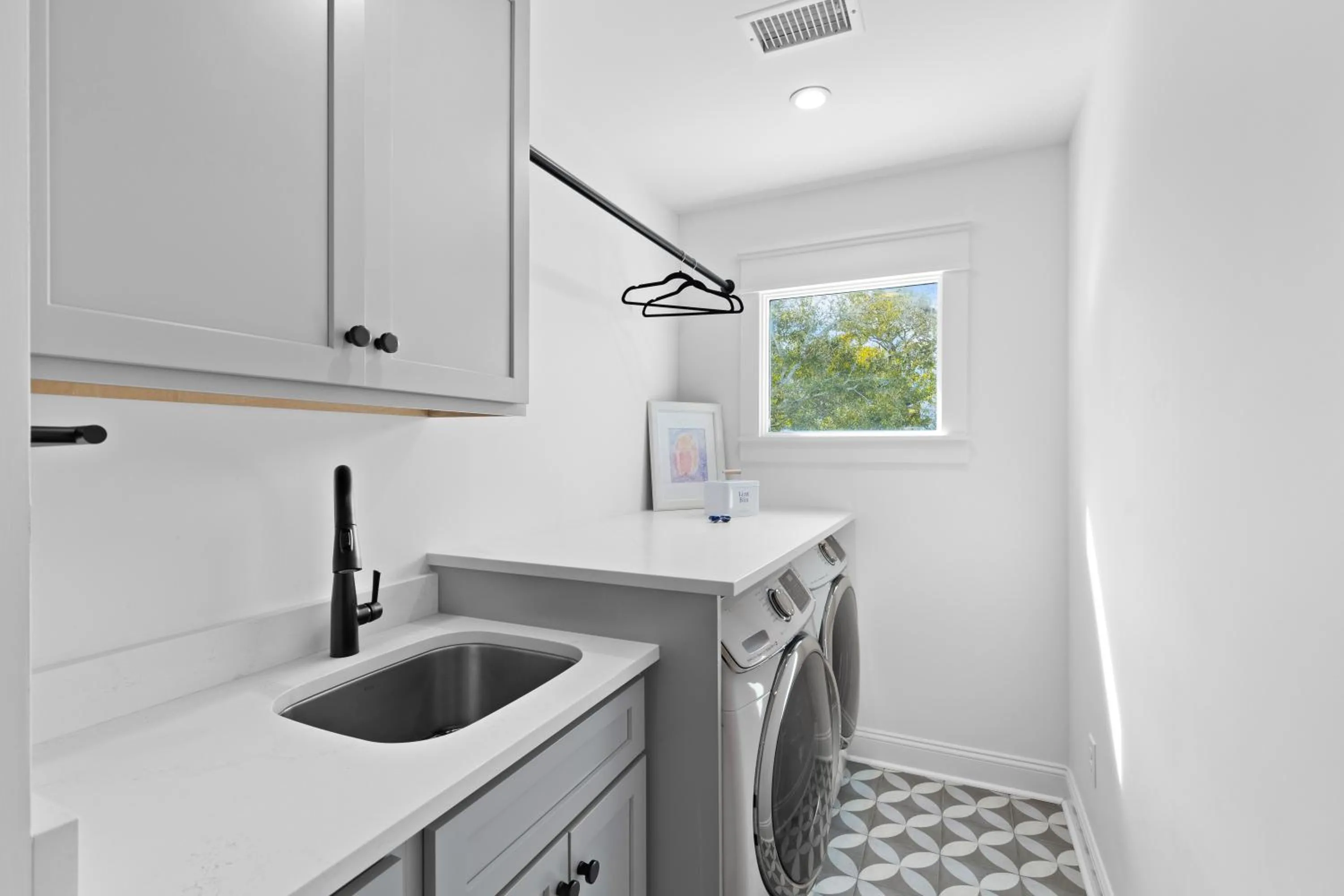 washing machine in Marsh Island 9 - Best Sunset on the Island! Renovated Home!