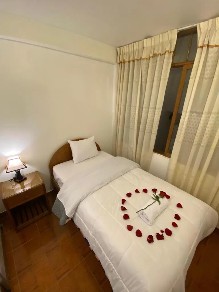 Bed in Inka House Hotel