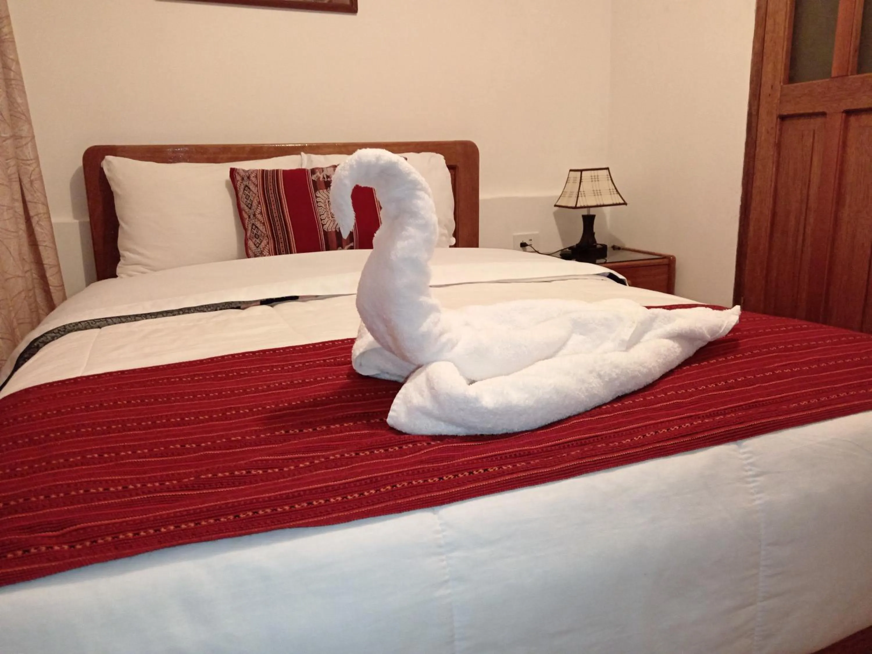 Bed in Inka House Hotel