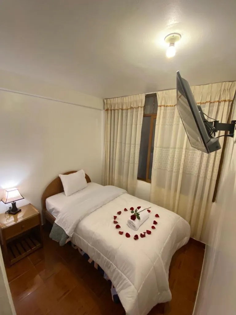 Bed in Inka House Hotel