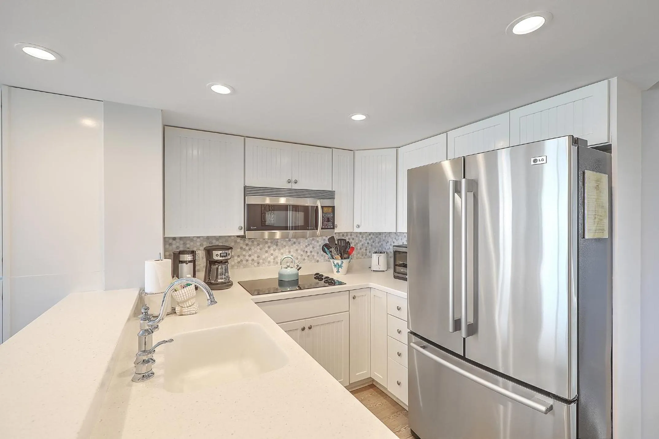 Kitchen or kitchenette in New Listing! Port O' Call B103 - Oceanfront Oasis!