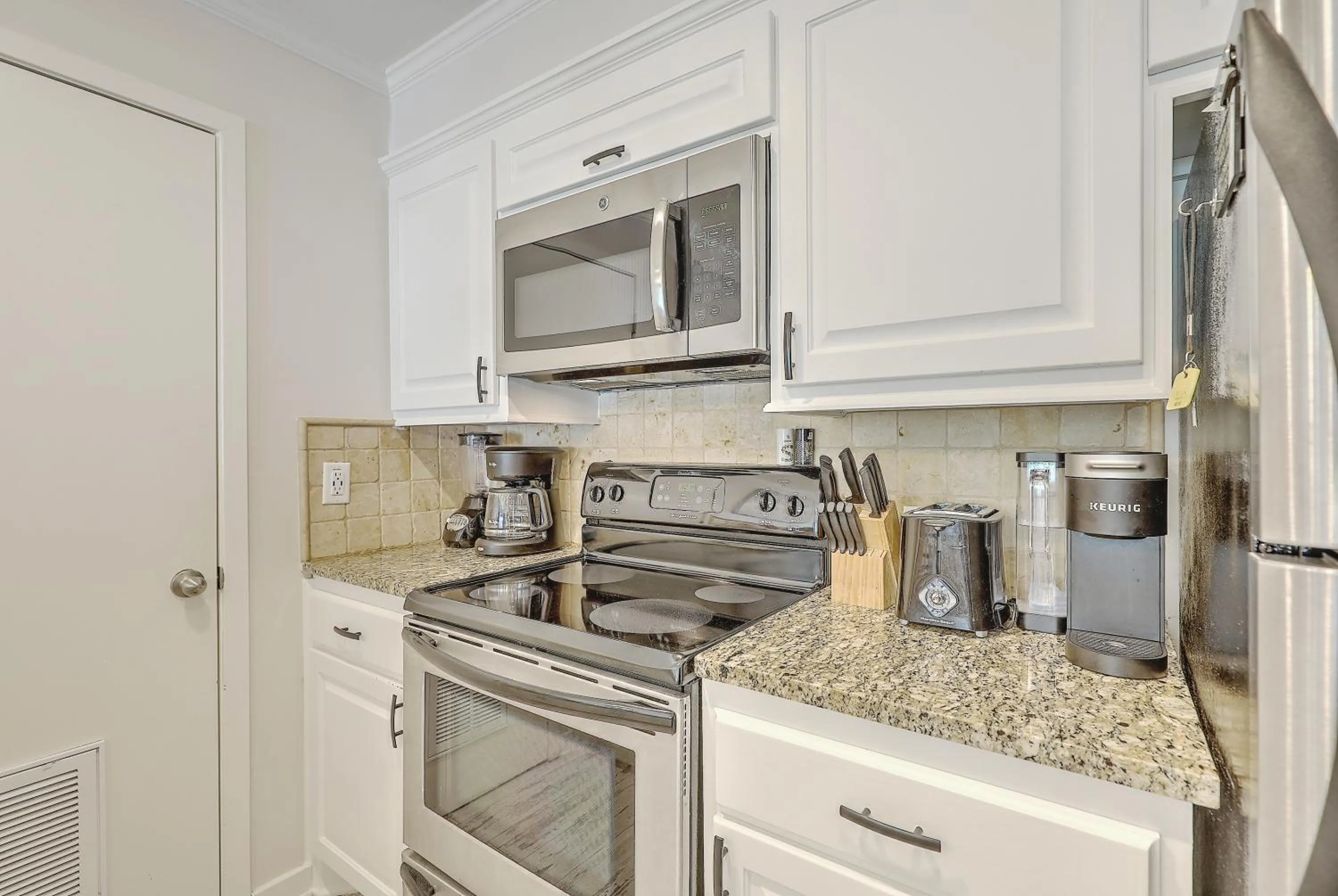 Kitchen or kitchenette in Lagoon Villa 9 - Superb Villa by Pool! Short Walk to Beach