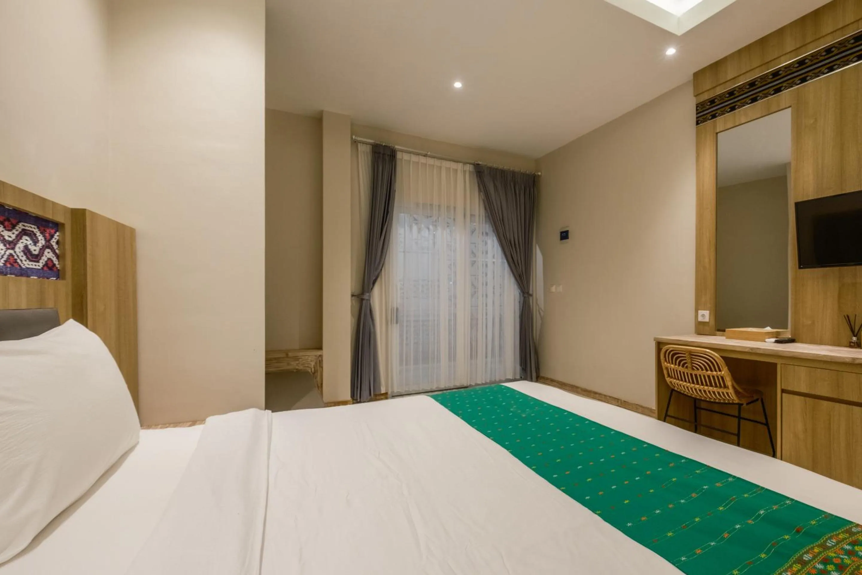 Bed in DEJAVU 2.0 HOTEL BAJO KOMODO