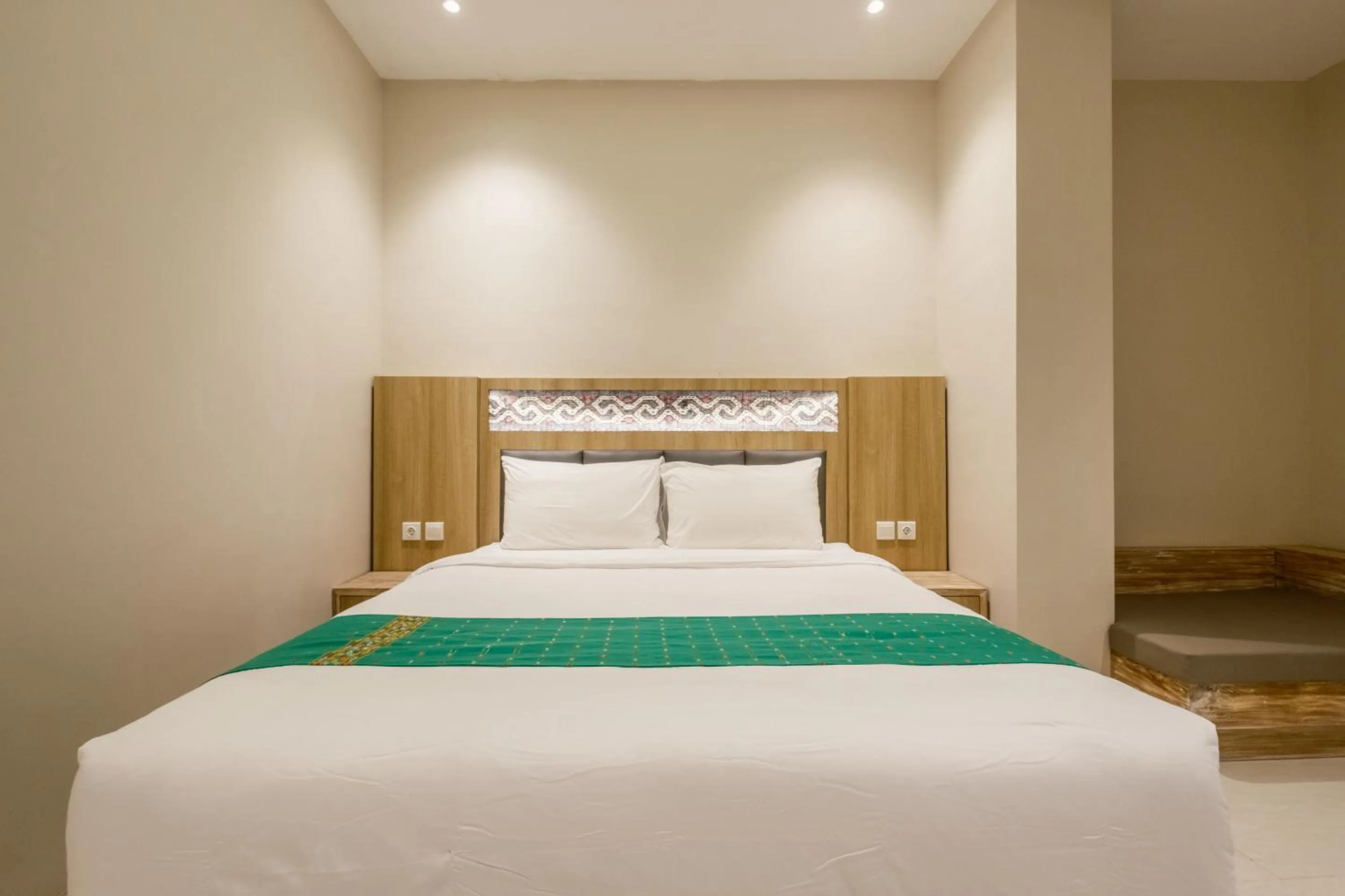 Bed in DEJAVU 2.0 HOTEL BAJO KOMODO