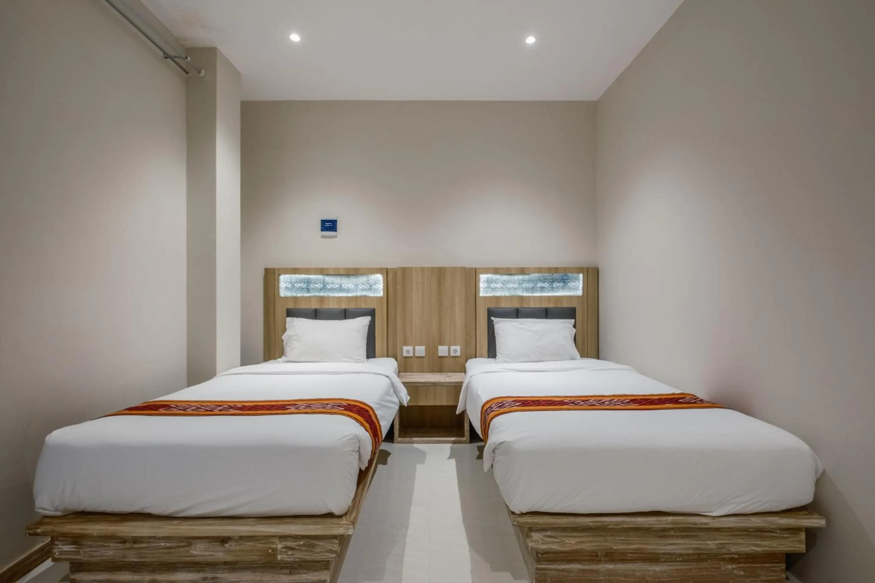 Bed in DEJAVU 2.0 HOTEL BAJO KOMODO