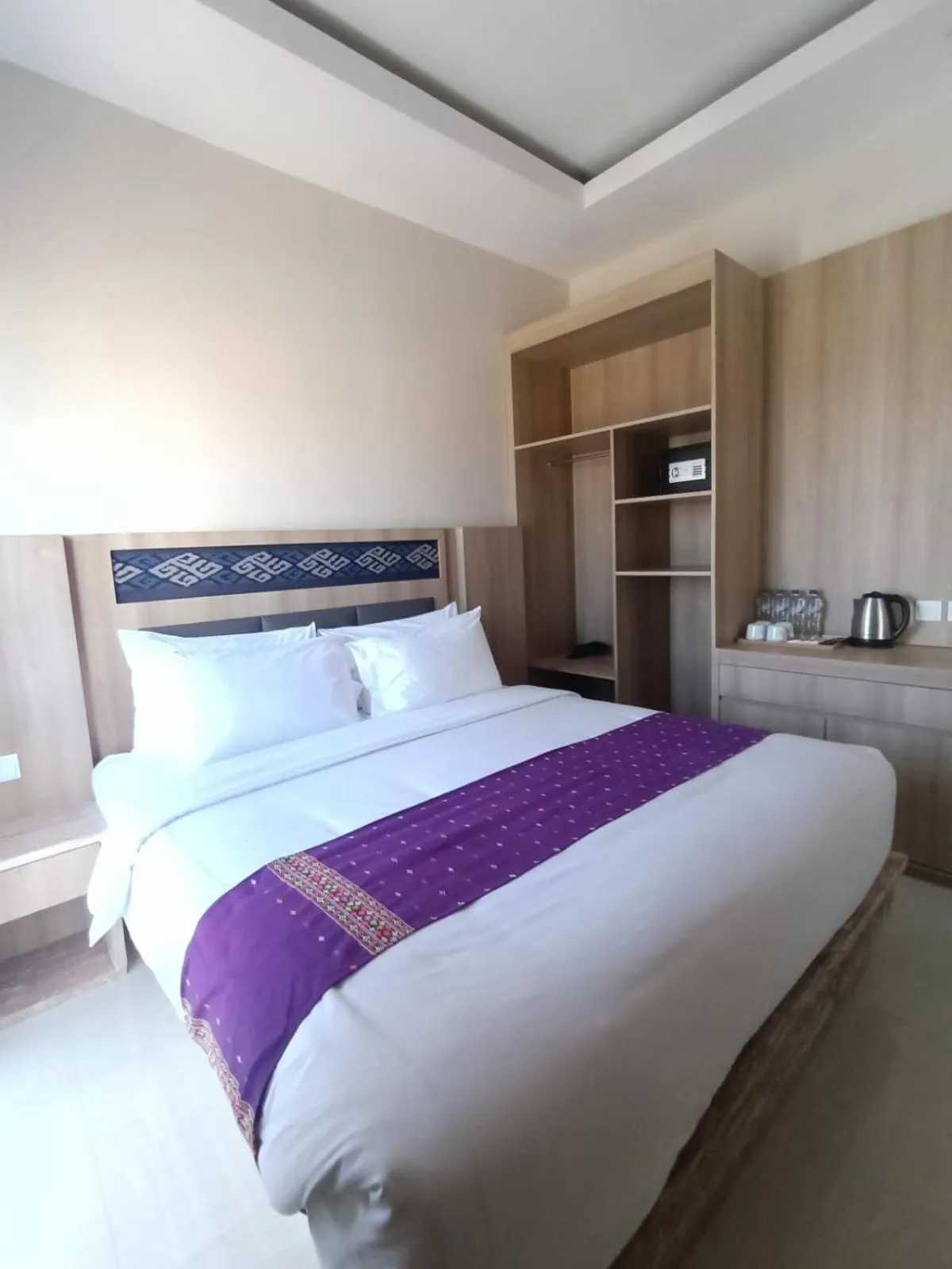 Bed in DEJAVU 2.0 HOTEL BAJO KOMODO