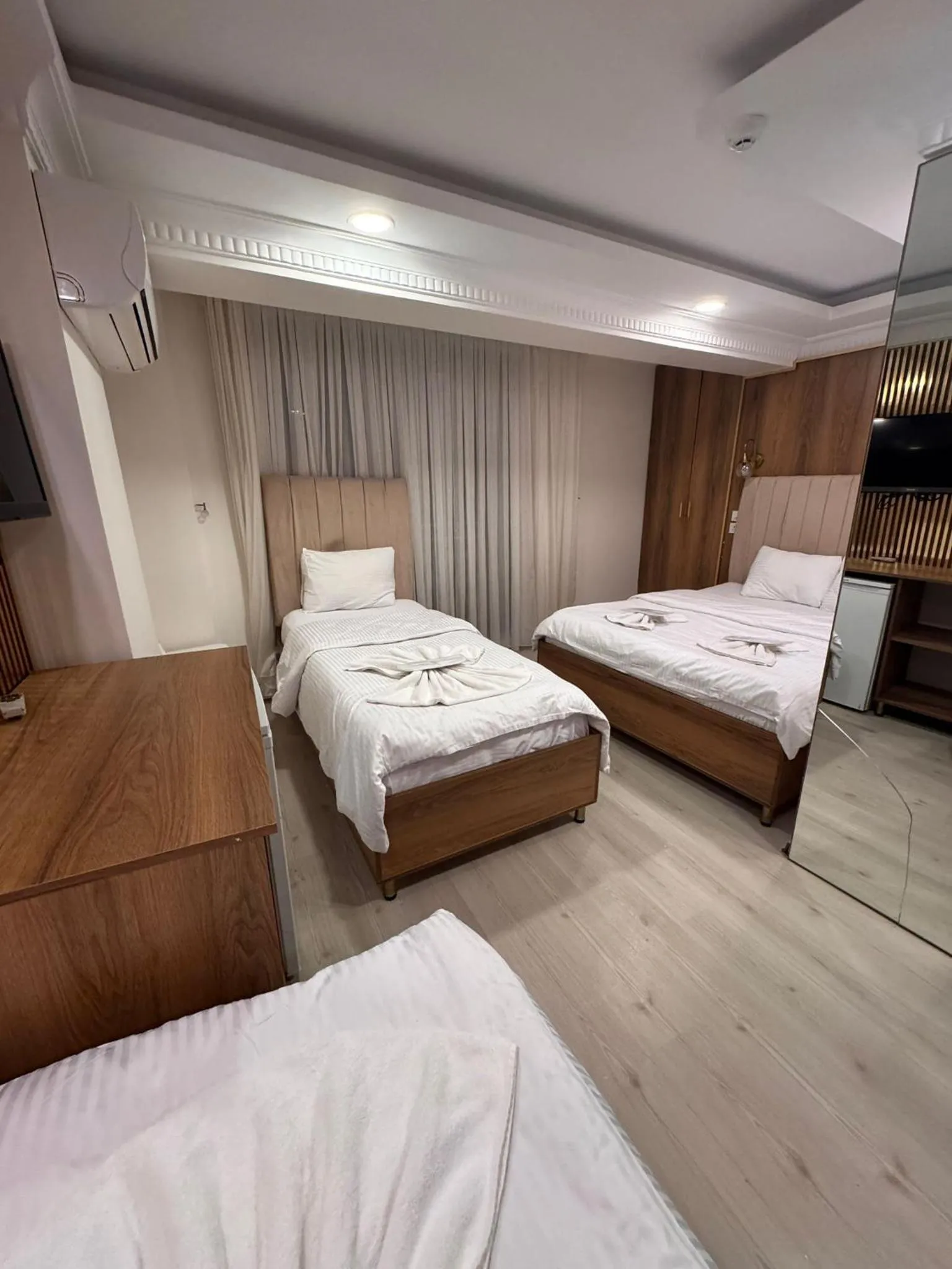 Bed in IMMORTELLE HOTEL