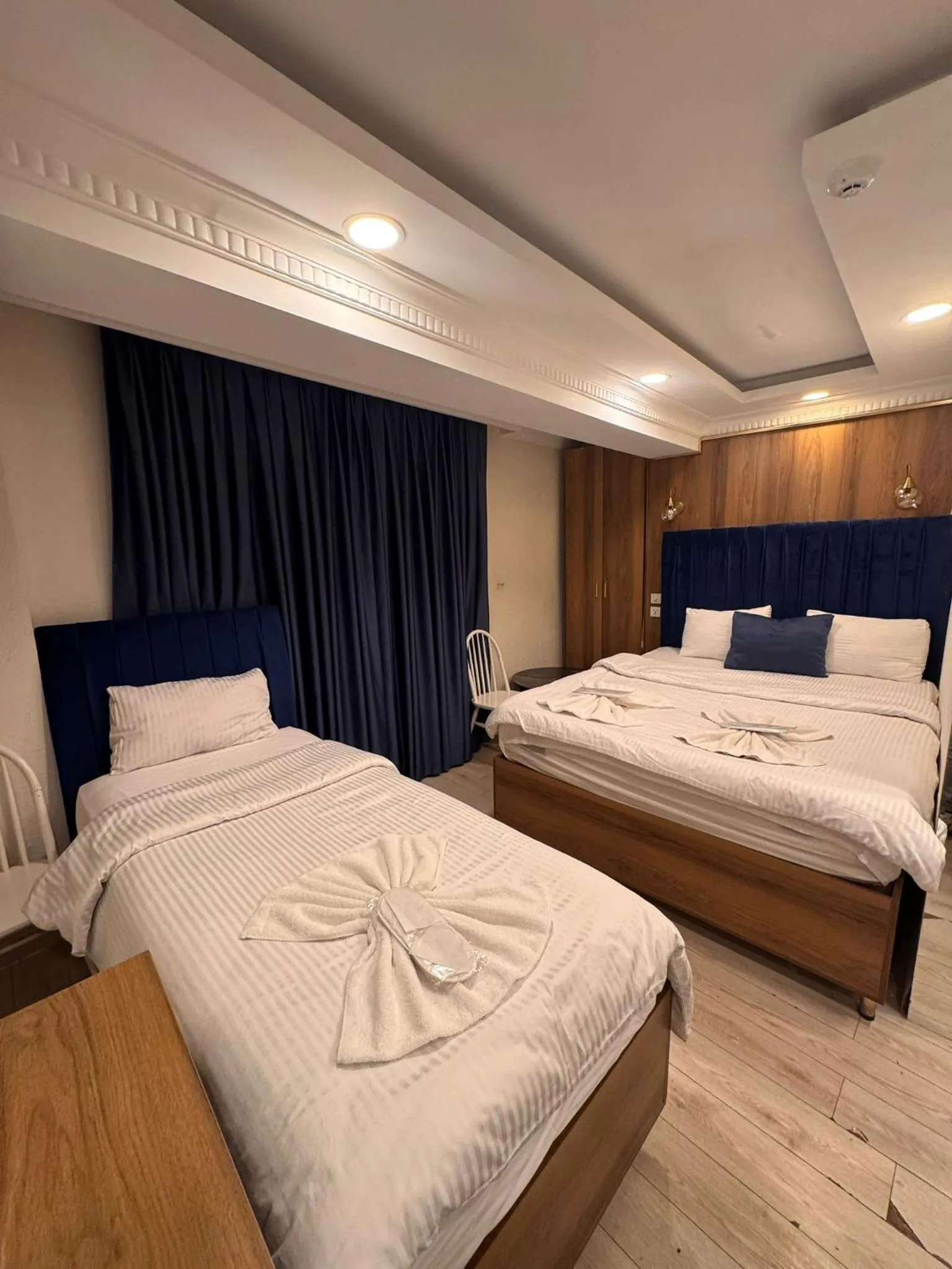 Bed in IMMORTELLE HOTEL