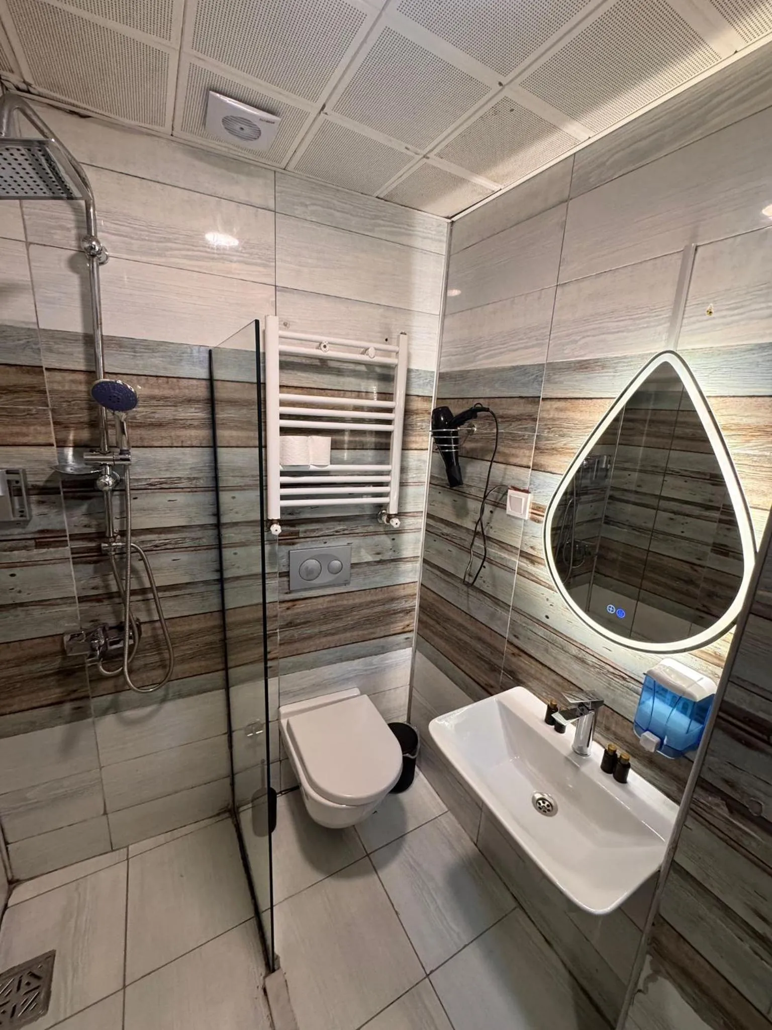 Shower in IMMORTELLE HOTEL