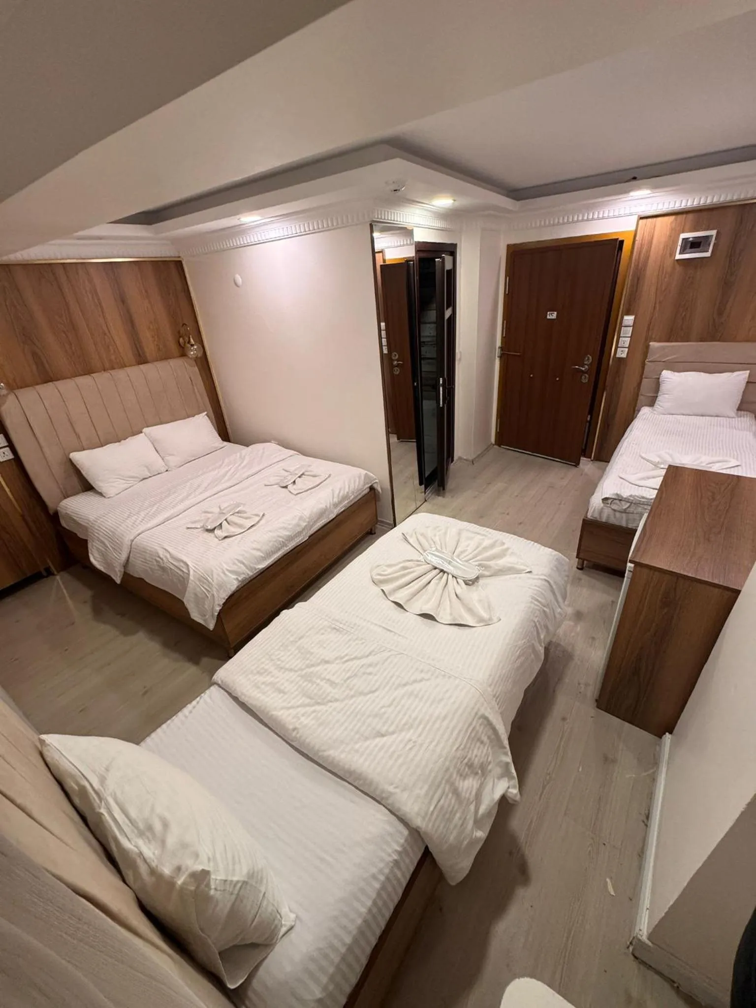 Bed in IMMORTELLE HOTEL