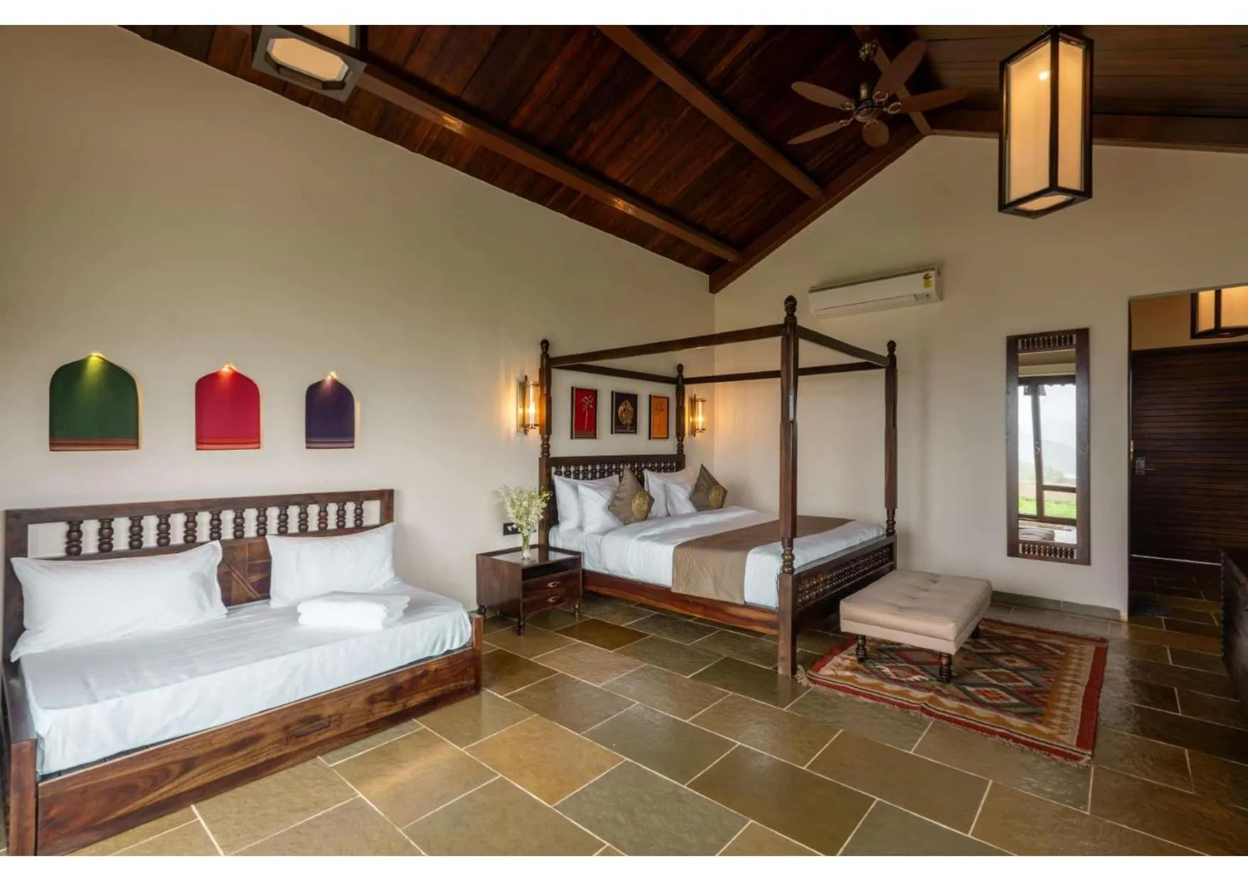 Bed in Malhar Machi Mountain Resorts