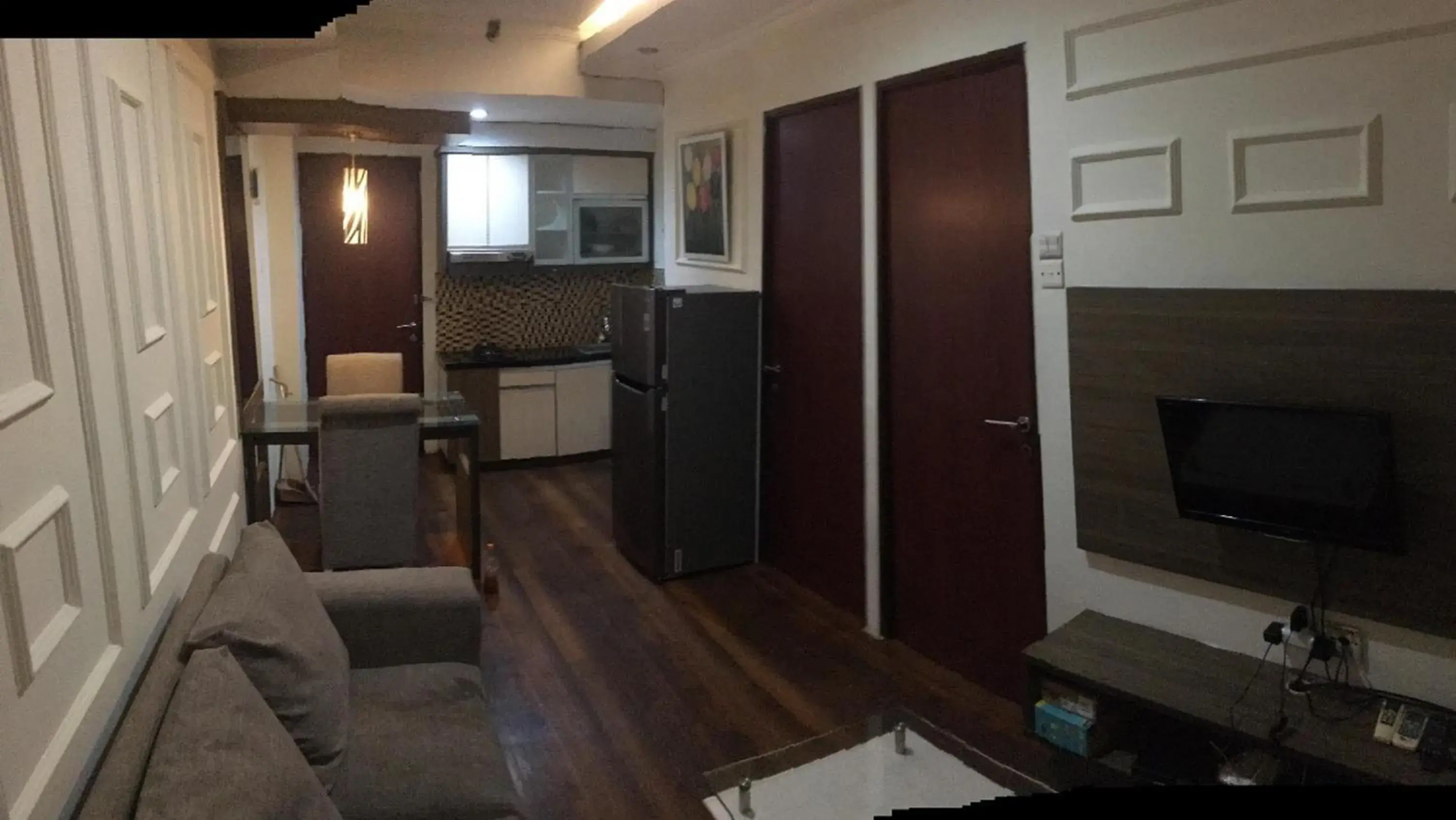 Living room in RedLiving Apartemen Tamansari Panoramic - Anwar Rental Living room in RedLiving Apartemen Tamansari Panoramic - Anwar Rental