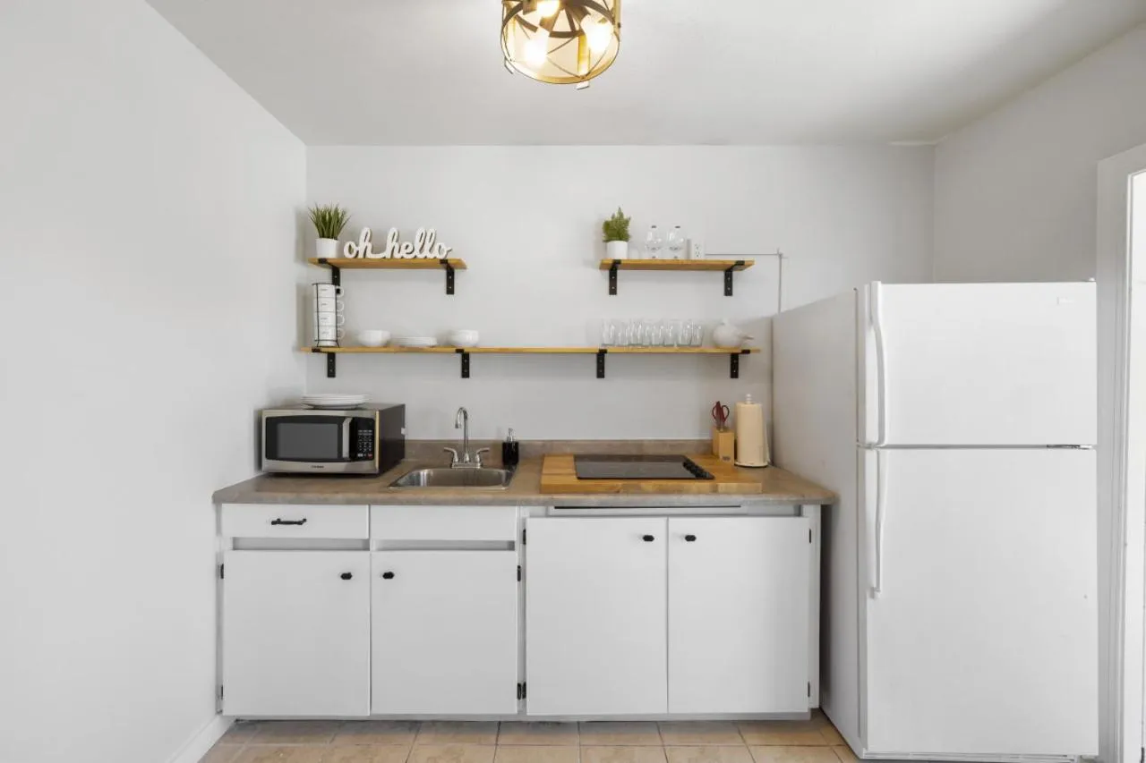 Kitchen or kitchenette in Cottage Bungalow Near Beach! King Bed with Pool & BBQ