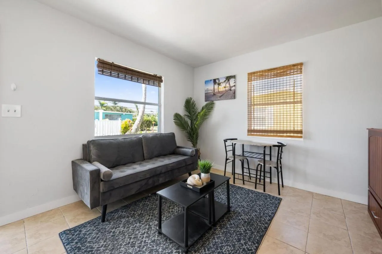 Living room in Cottage Bungalow Near Beach! King Bed with Pool & BBQ