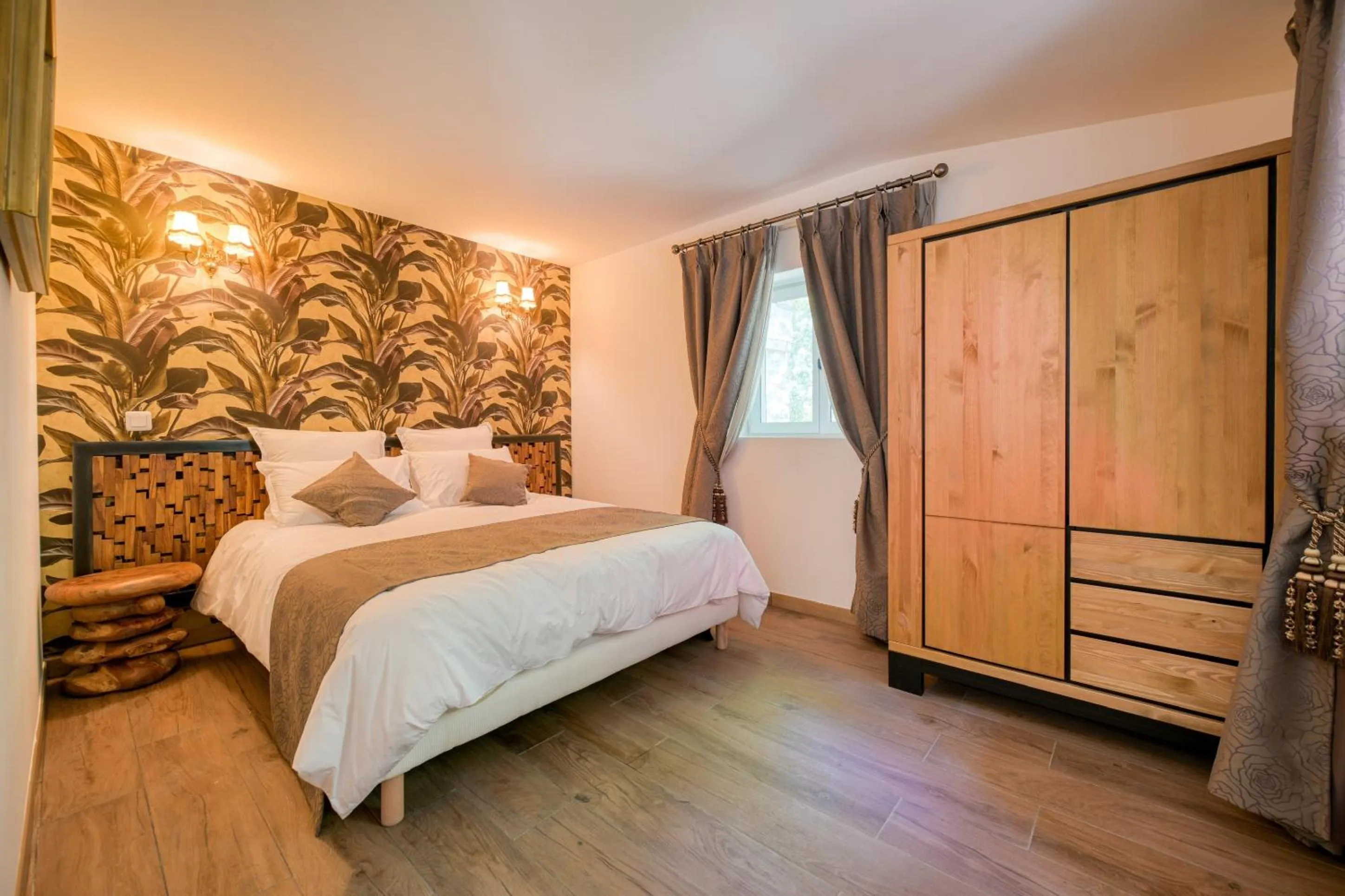 Bed in Le Petit Château de Barbizon au Bois du Mée