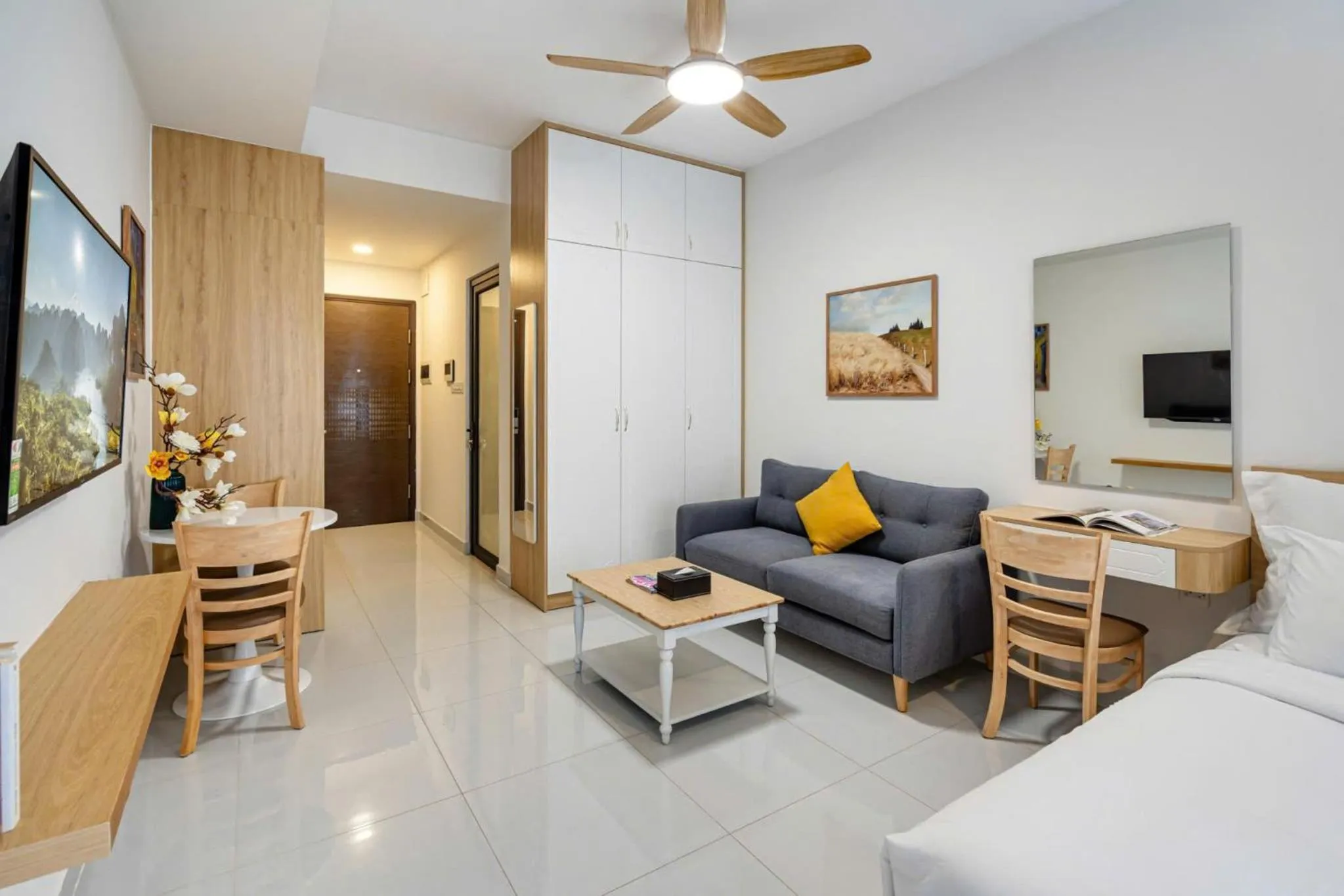 Communal lounge/ TV room in Otis Soho Saigon Balcony Apartment