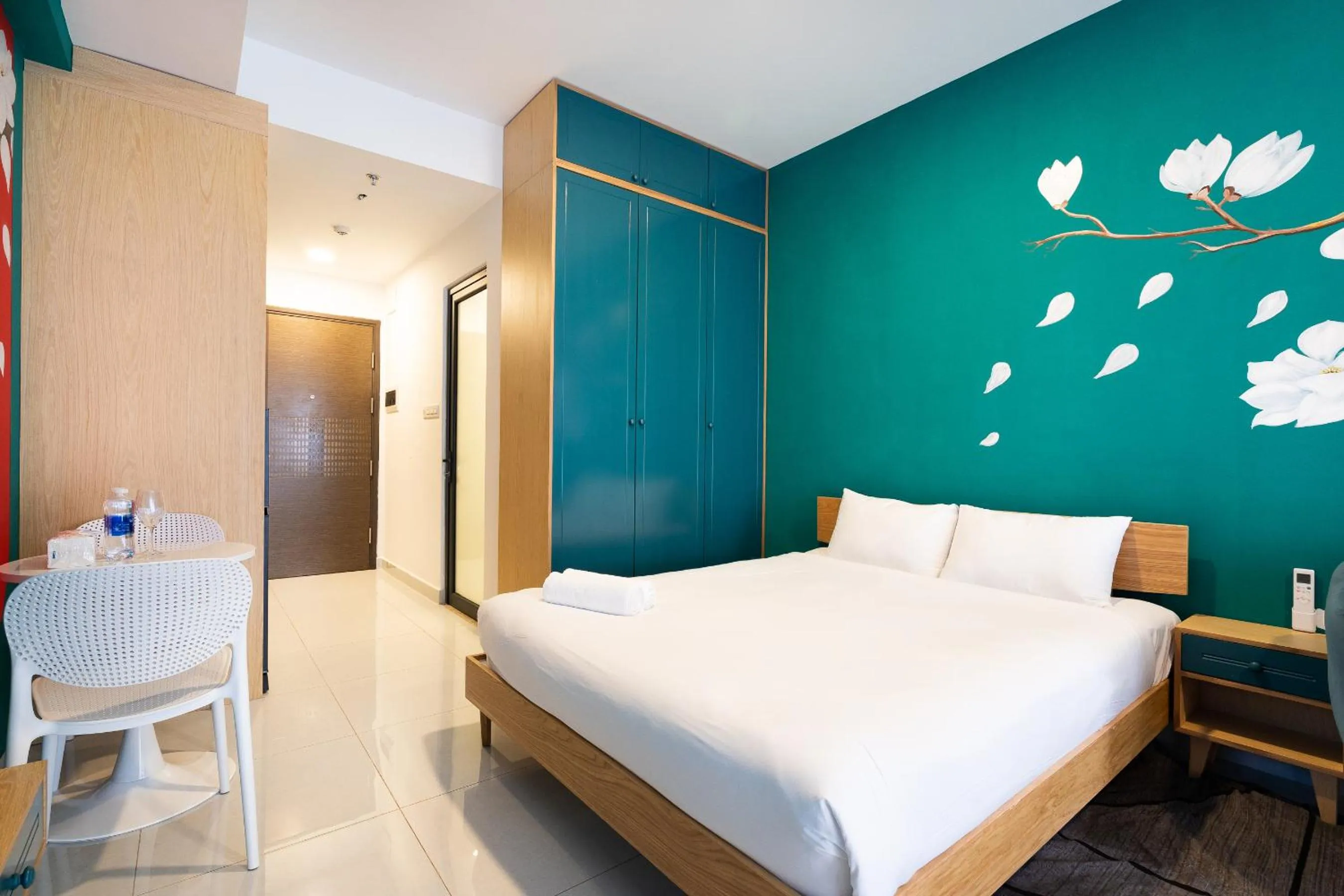 Bed in Otis Soho Saigon Balcony Apartment