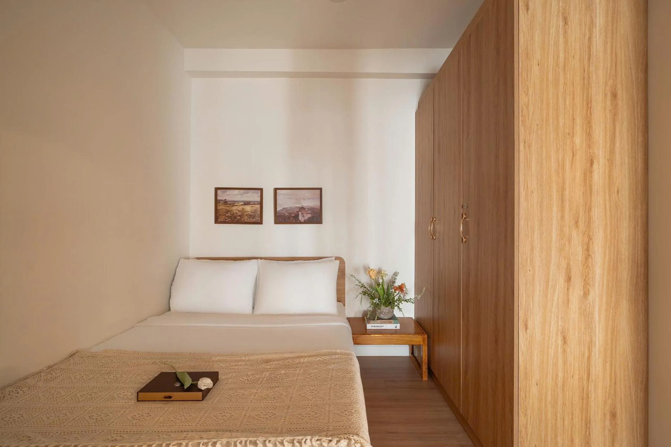 Bed in Otis Soho Saigon Balcony Apartment